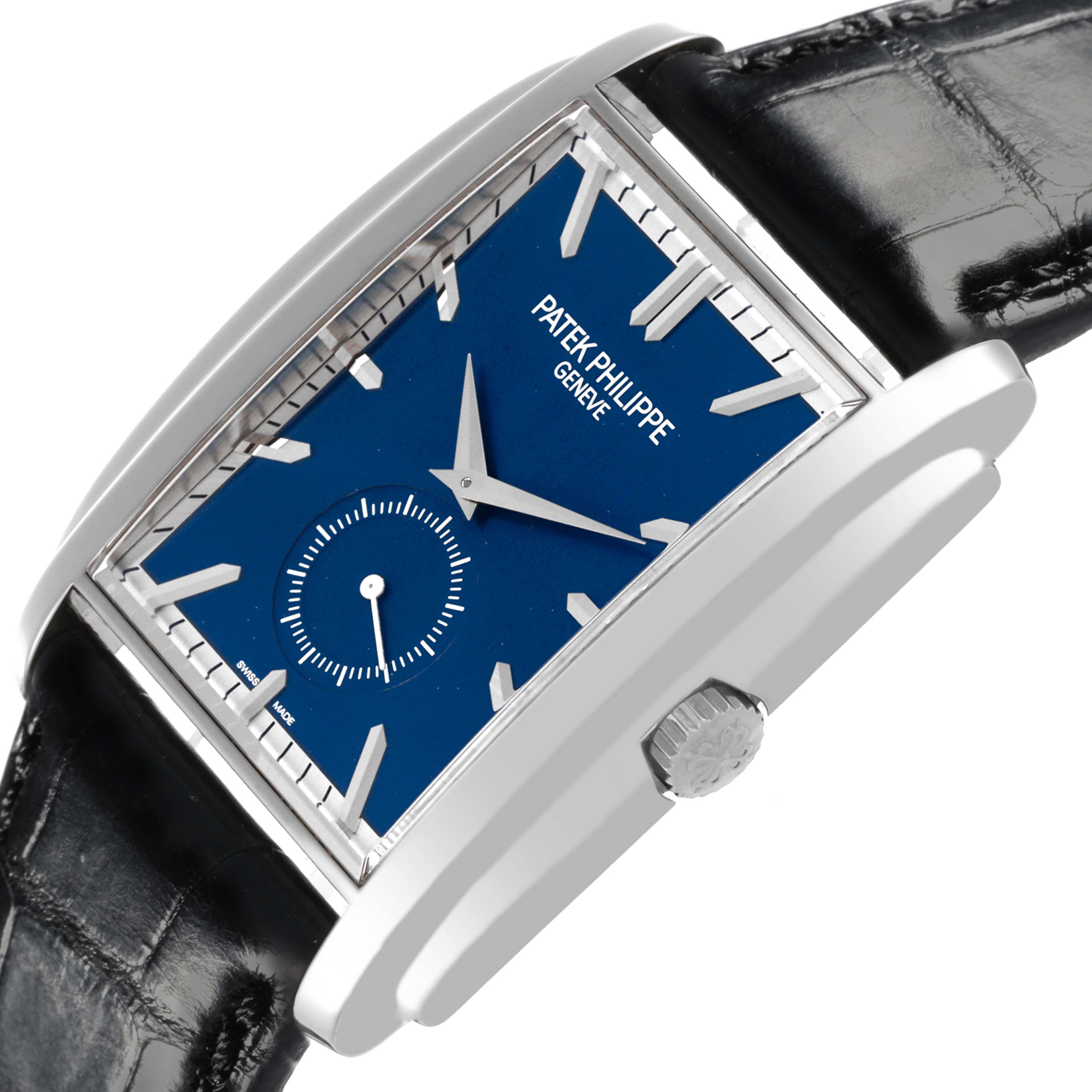 The Patek Philippe Gondolo 5124G-011 Men's White Gold Blue Dial watch is shown at an angle highlighting the dial, crown, and part of the strap.