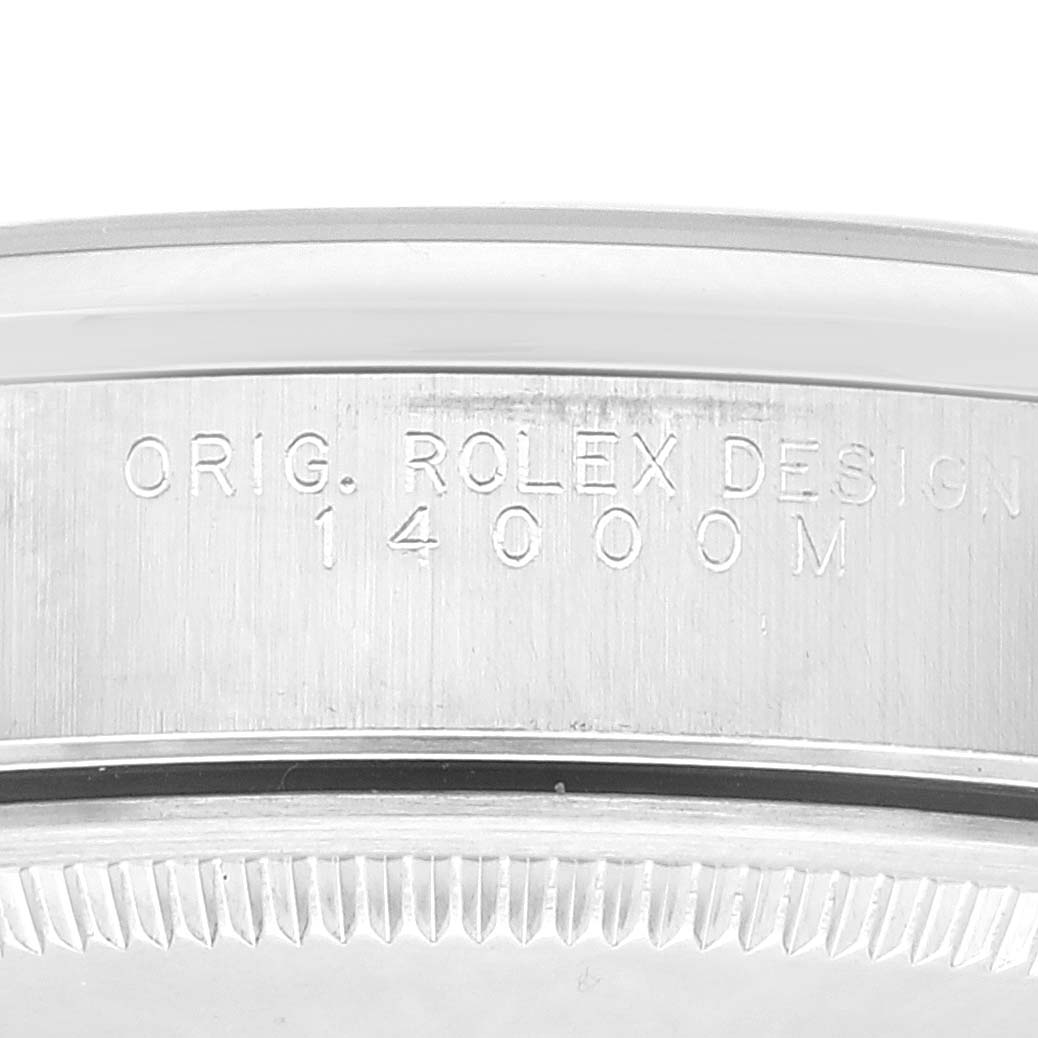 The image shows a close-up of the side of the Rolex Air-King 14000 Men's Stainless Steel Black Dial 14000 Men's Stainless Steel Black Dial, highlighting the engraved "ORIG. ROLEX DESIGN 14000 M".