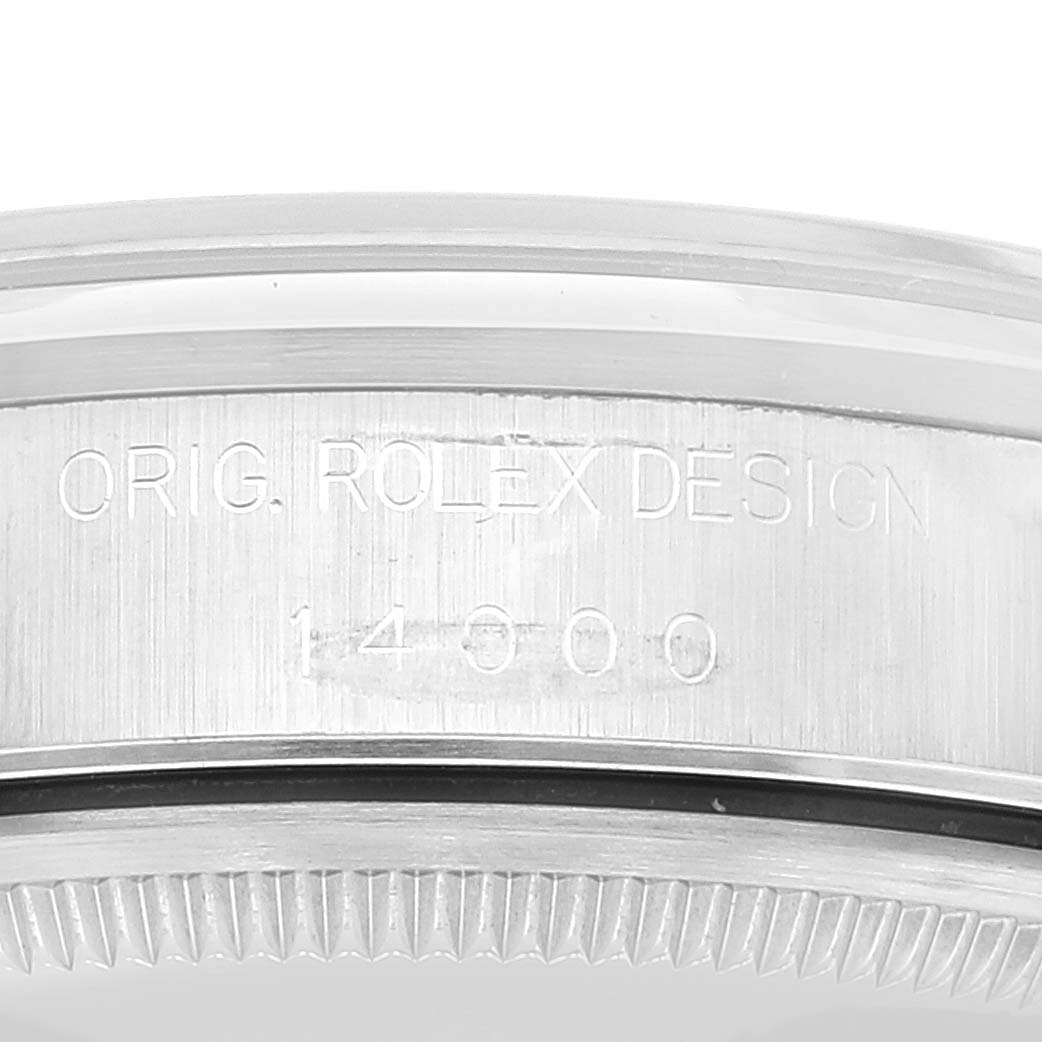 This image shows a close-up angle of the case back of a Rolex Air-King 14000 Men's Stainless Steel Blue Dial 14000 Men's Stainless Steel Blue Dial, highlighting the engraving and bezel.
