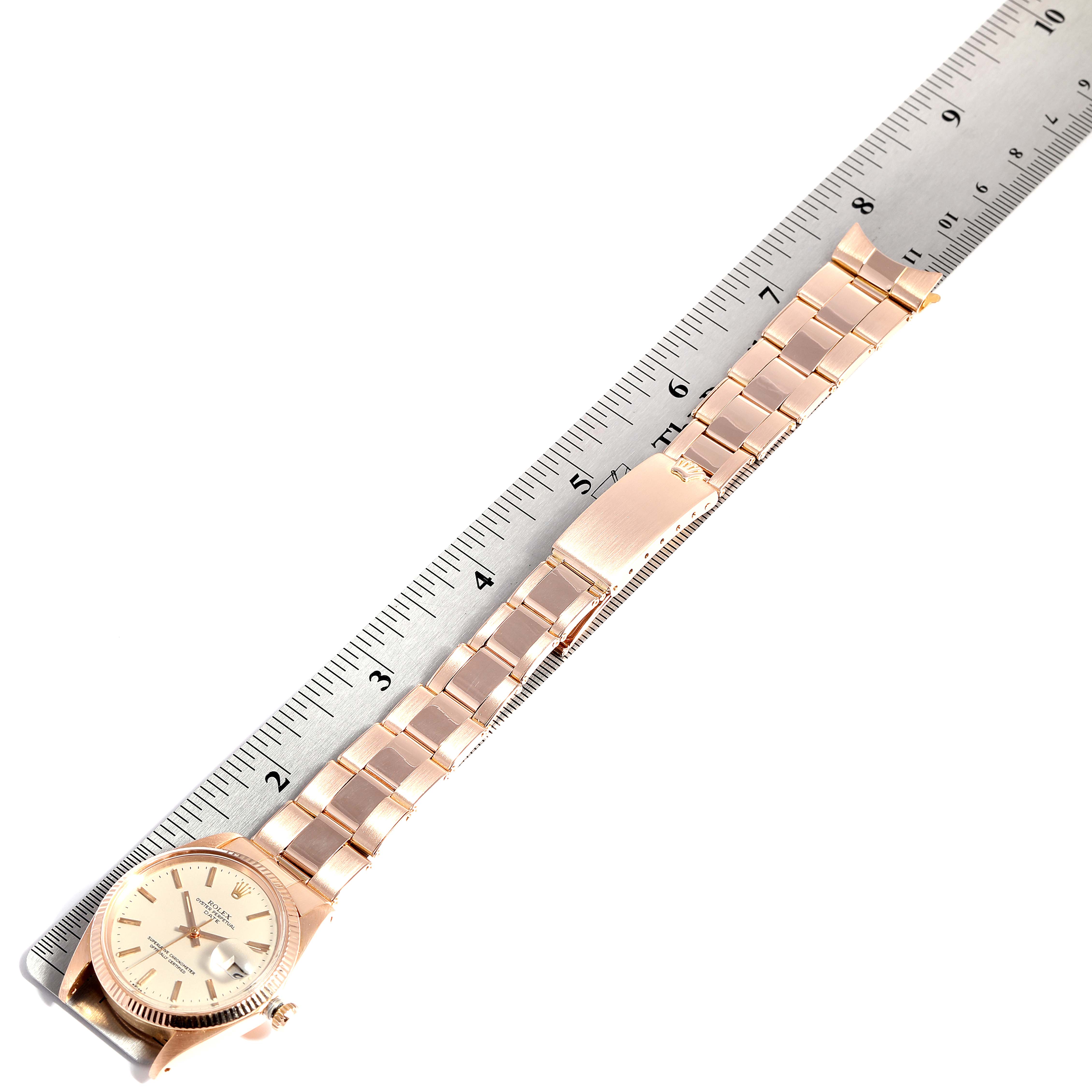 The image shows a side angle of a Vintage Collection Rolex watch, displaying its bracelet and clasp alongside a ruler.