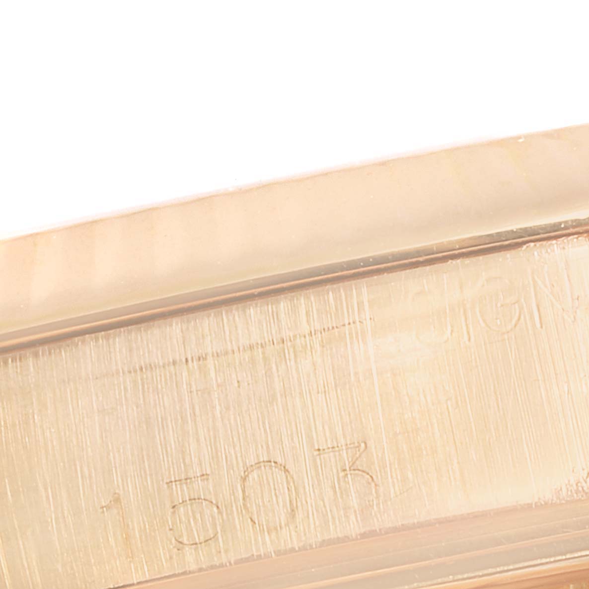 This image shows an engraved part with the serial number of the Rolex Vintage Collection 1503 Men's Rose Gold Silver Dial 1503 Men's Rose Gold Silver Dial watch, model 1503.
