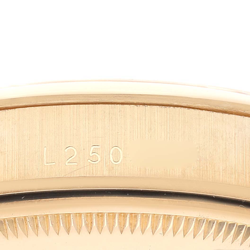 The image shows a close-up of the edge of the case and part of the bezel of a Rolex Vintage Collection 15008 Men's Yellow Gold White Dial 15008 Men's Yellow Gold White Dial model.
