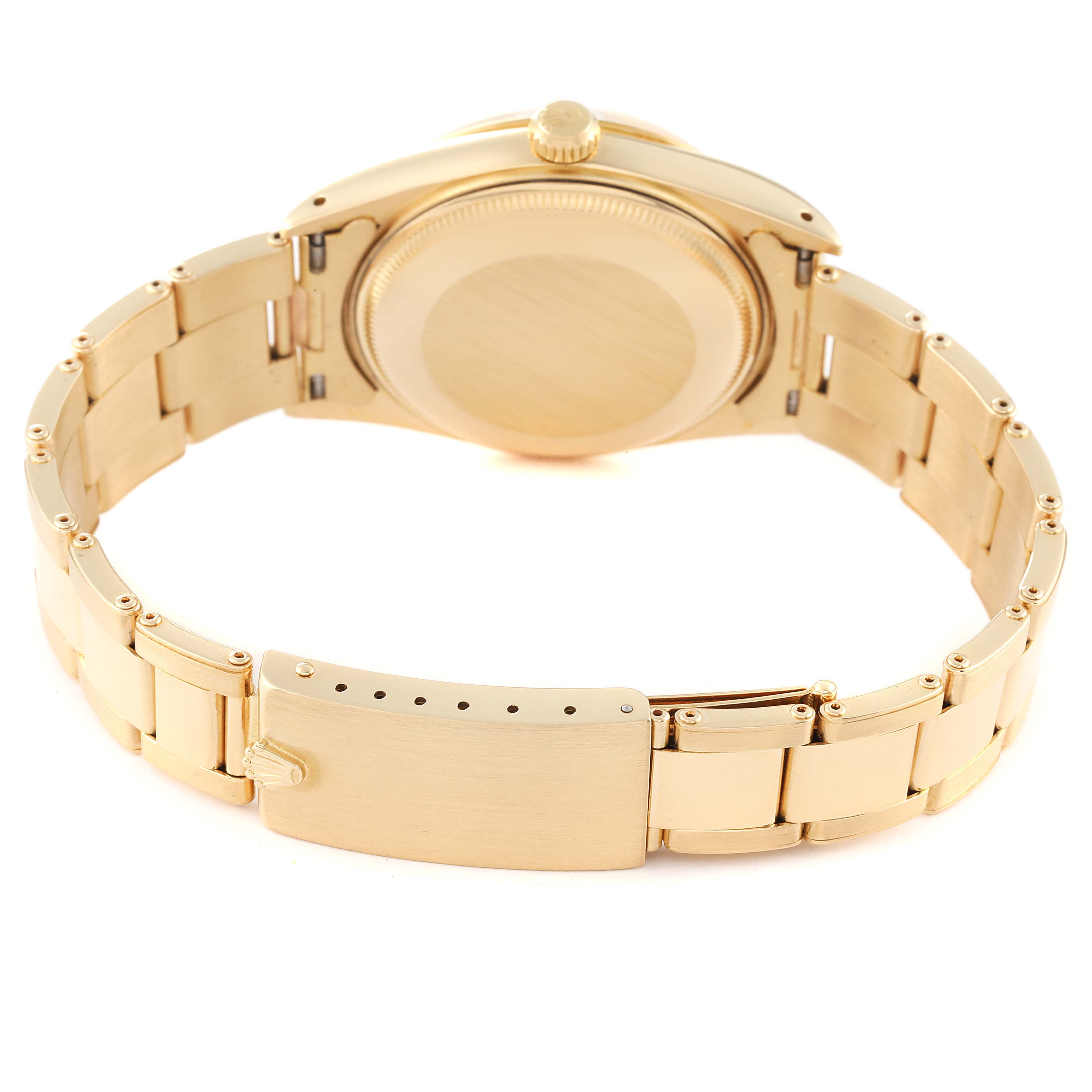 This image shows the back view of a Rolex Vintage Collection 15008 Men's Yellow Gold White Dial 15008 Men's Yellow Gold White Dial watch, highlighting the case back and bracelet with clasp.