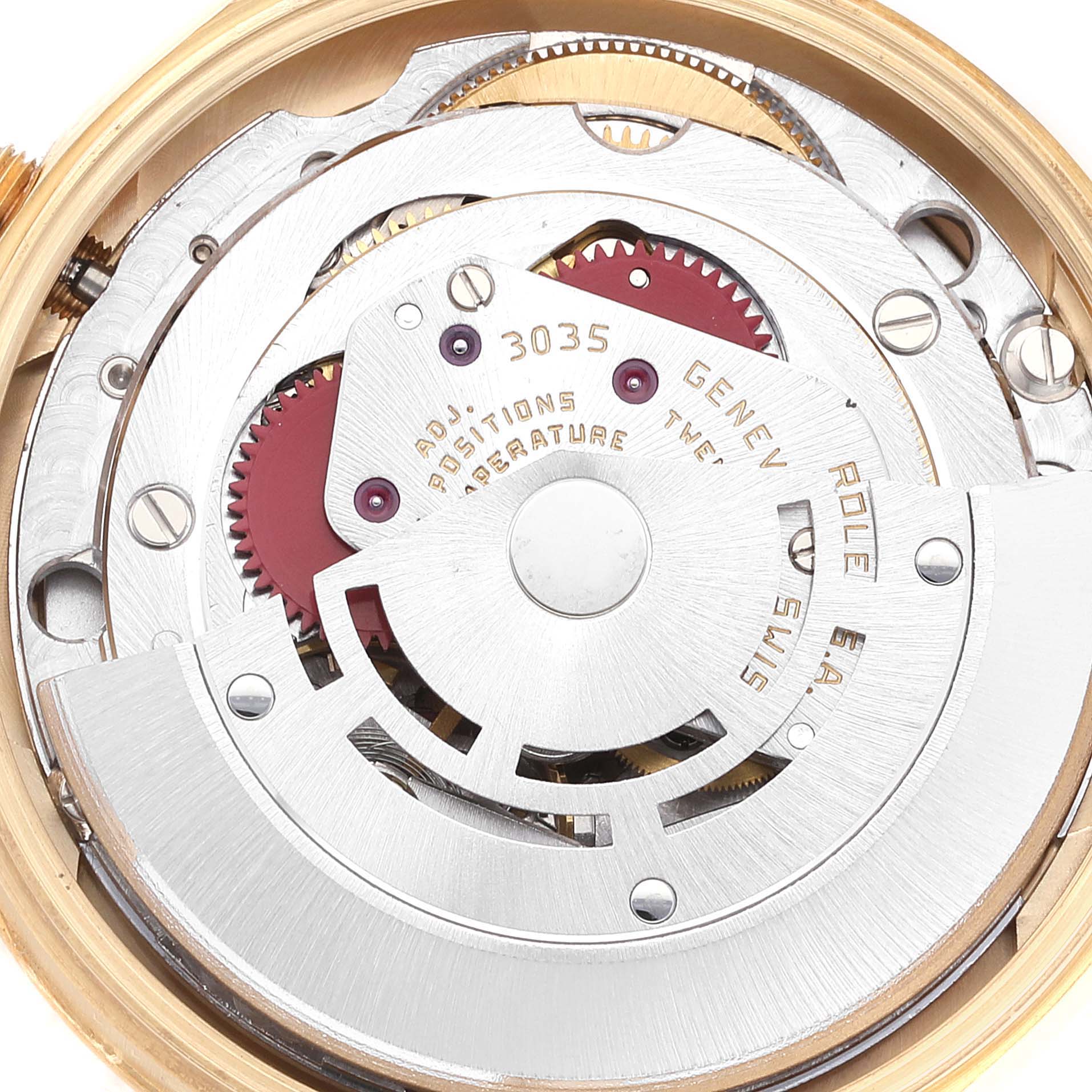 The image shows the intricate internal mechanism of a Rolex Vintage Collection 15008 Men's Yellow Gold White Dial 15008 Men's Yellow Gold White Dial watch viewed from the back.