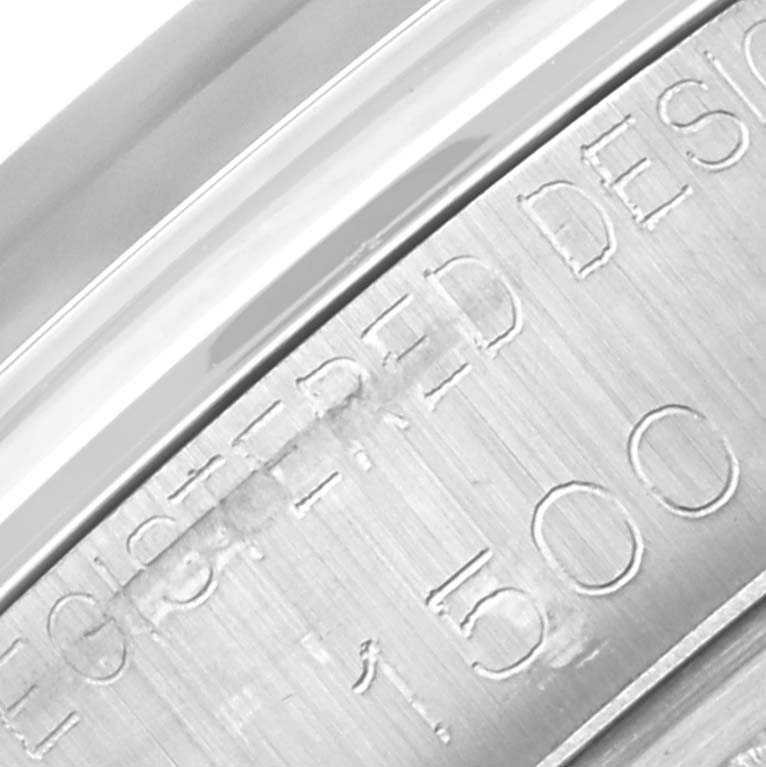Close-up of the side case and serial number engraved on a Rolex Vintage Collection 1500 Men's Stainless Steel Brown Dial 1500 Men's Stainless Steel Brown Dial watch.