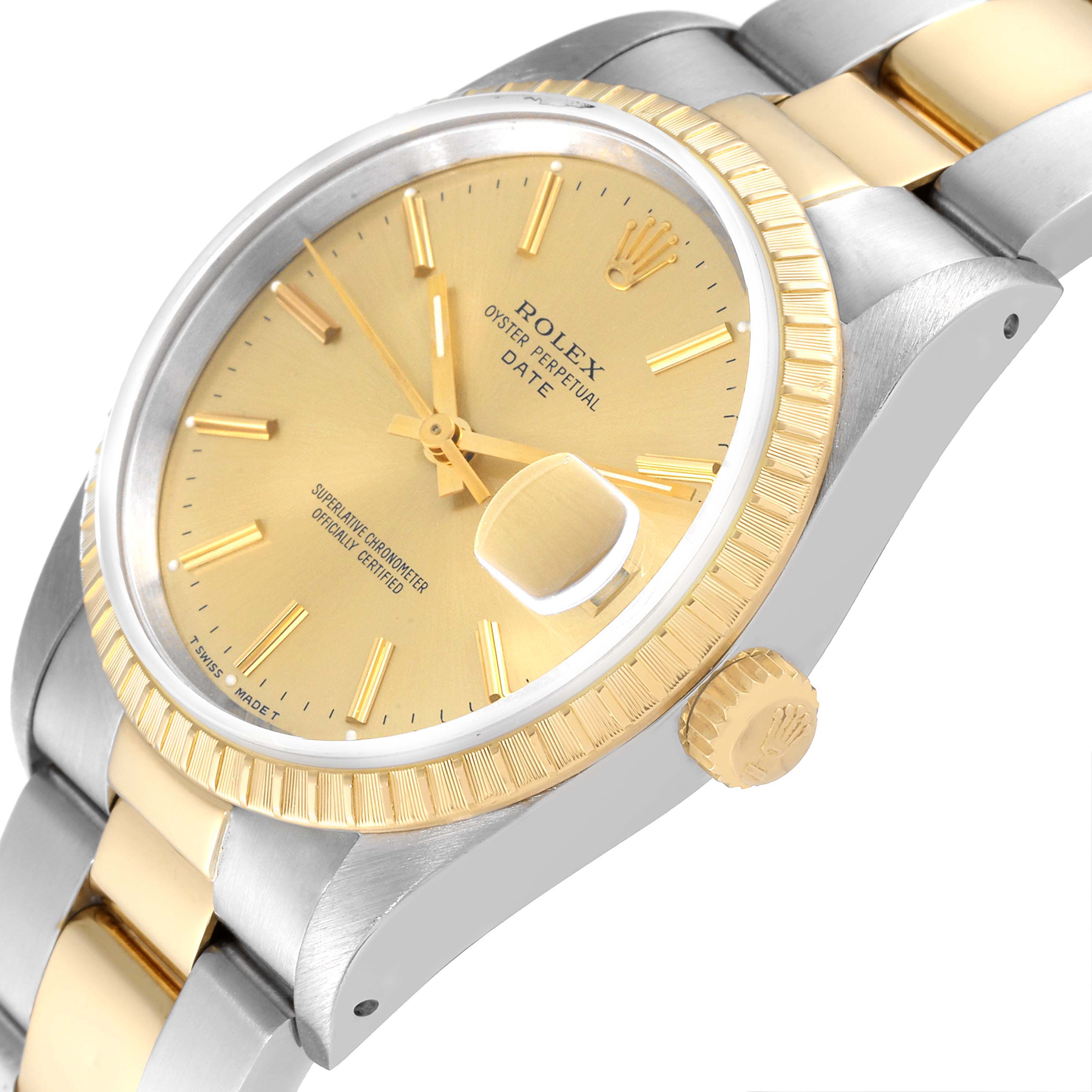 The Rolex Date 15223 Men
s Steel and Gold (two tone) Champagne Dial 15223 Men
s Steel and Gold (two tone) Champagne Dial model watch is shown at an angled view highlighting its gold dial, crown, and two-tone bracelet.