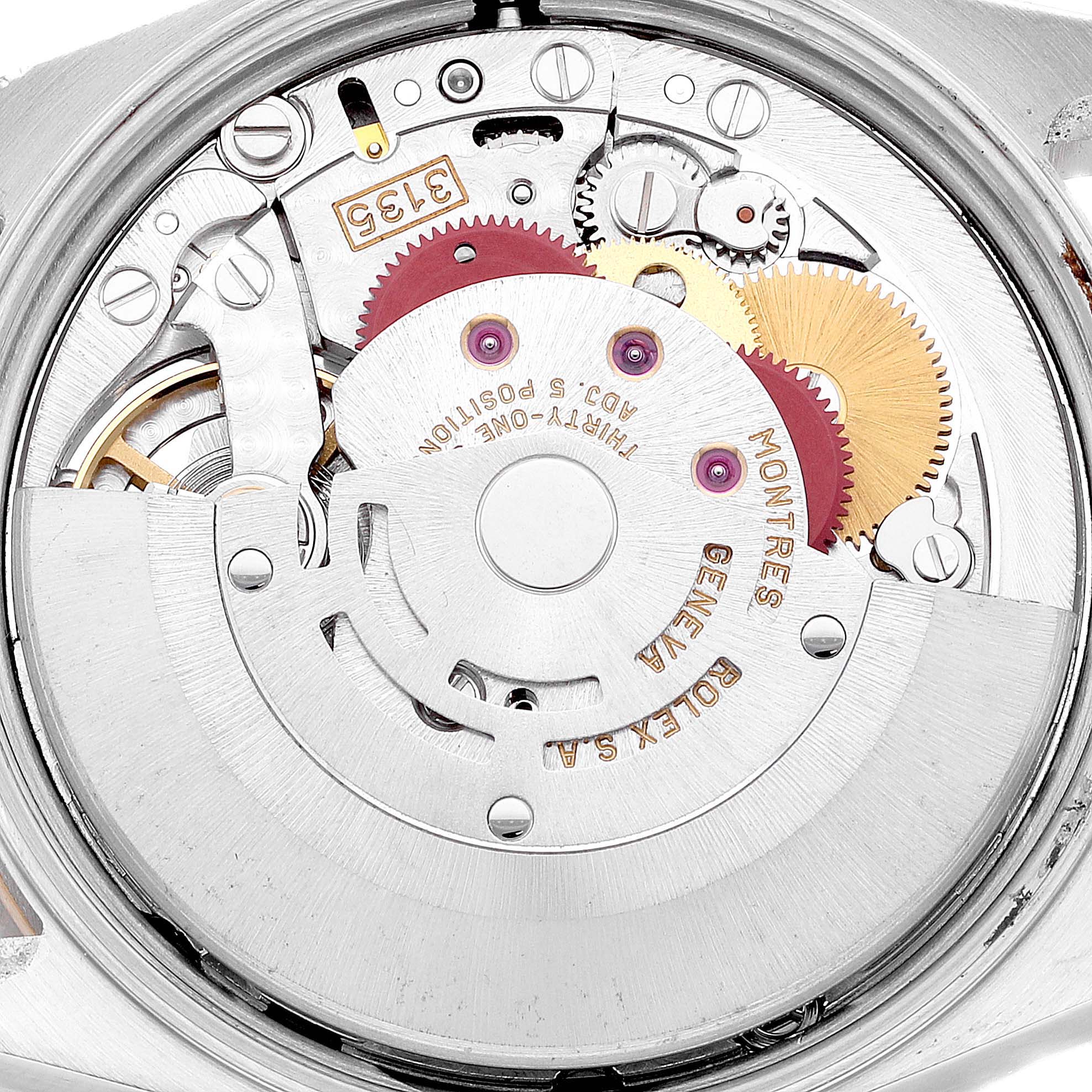 This is a close-up image of the internal automatic movement mechanism of a Rolex Date 15223 Men
s Steel and Gold (two tone) Champagne Dial 15223 Men
s Steel and Gold (two tone) Champagne Dial model watch.