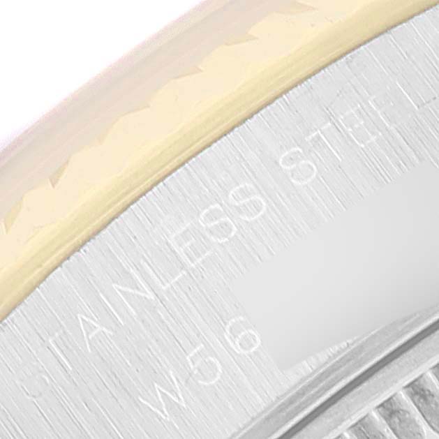 The image shows a close-up view of the outer edge engraving on the case back of a Rolex Datejust 69173 Women's Steel and Gold (two tone) Champagne Dial 69173 Women's Steel and Gold (two tone) Champagne Dial watch.