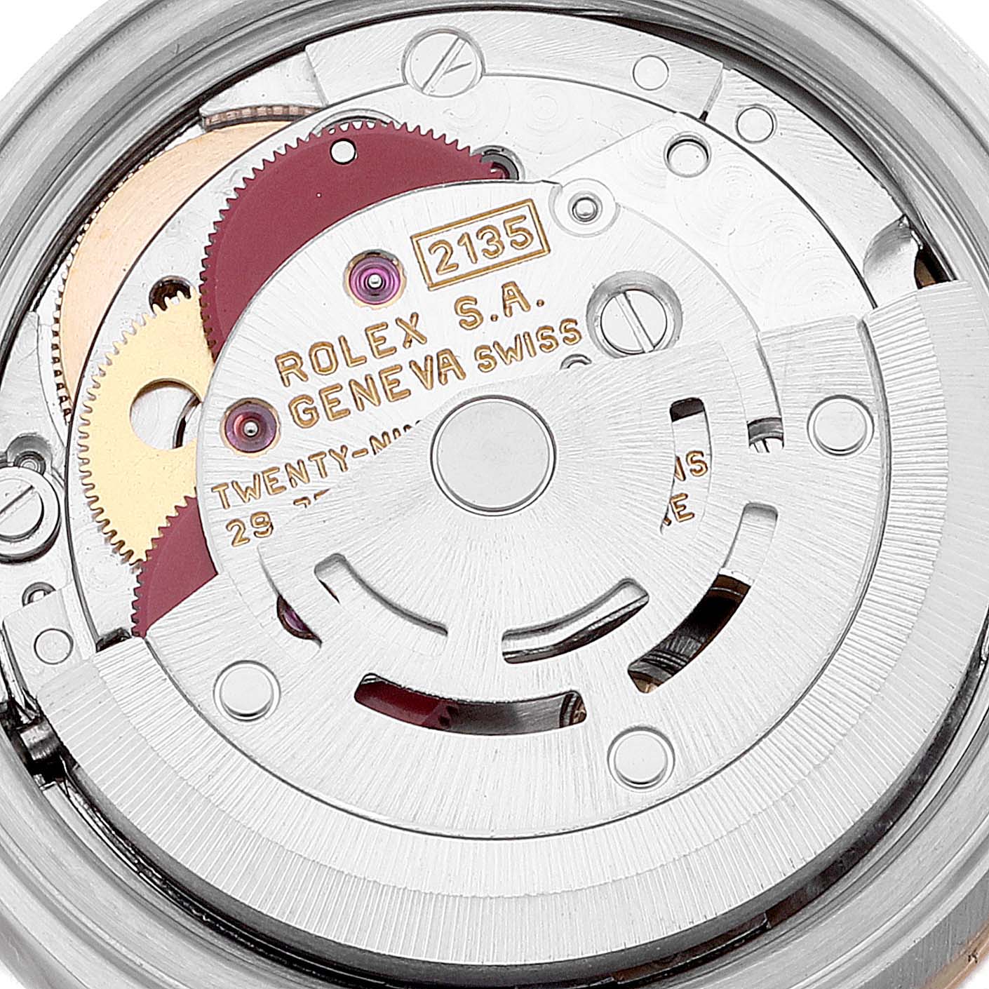 This image shows an internal view of the Rolex Datejust 69173 Women's Steel and Gold (two tone) Champagne Dial 69173 Women's Steel and Gold (two tone) Champagne Dial's movement, focusing on its gears and rotor.