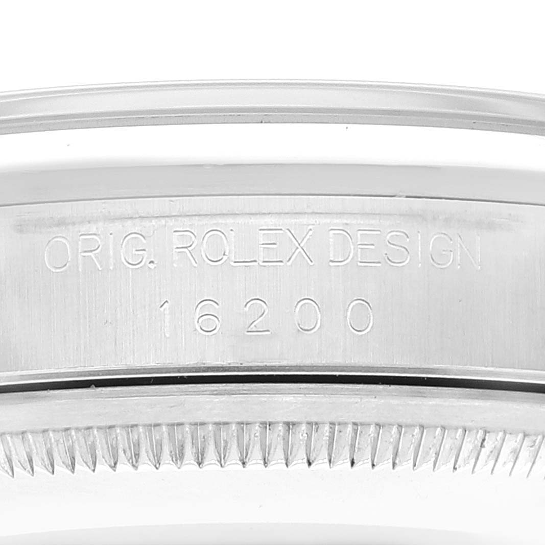 The image shows a close-up of the engraved inner bezel of a Rolex Datejust 16200 Men's Stainless Steel Grey Dial 16200 Men's Stainless Steel Grey Dial model, displaying the model number 16200.