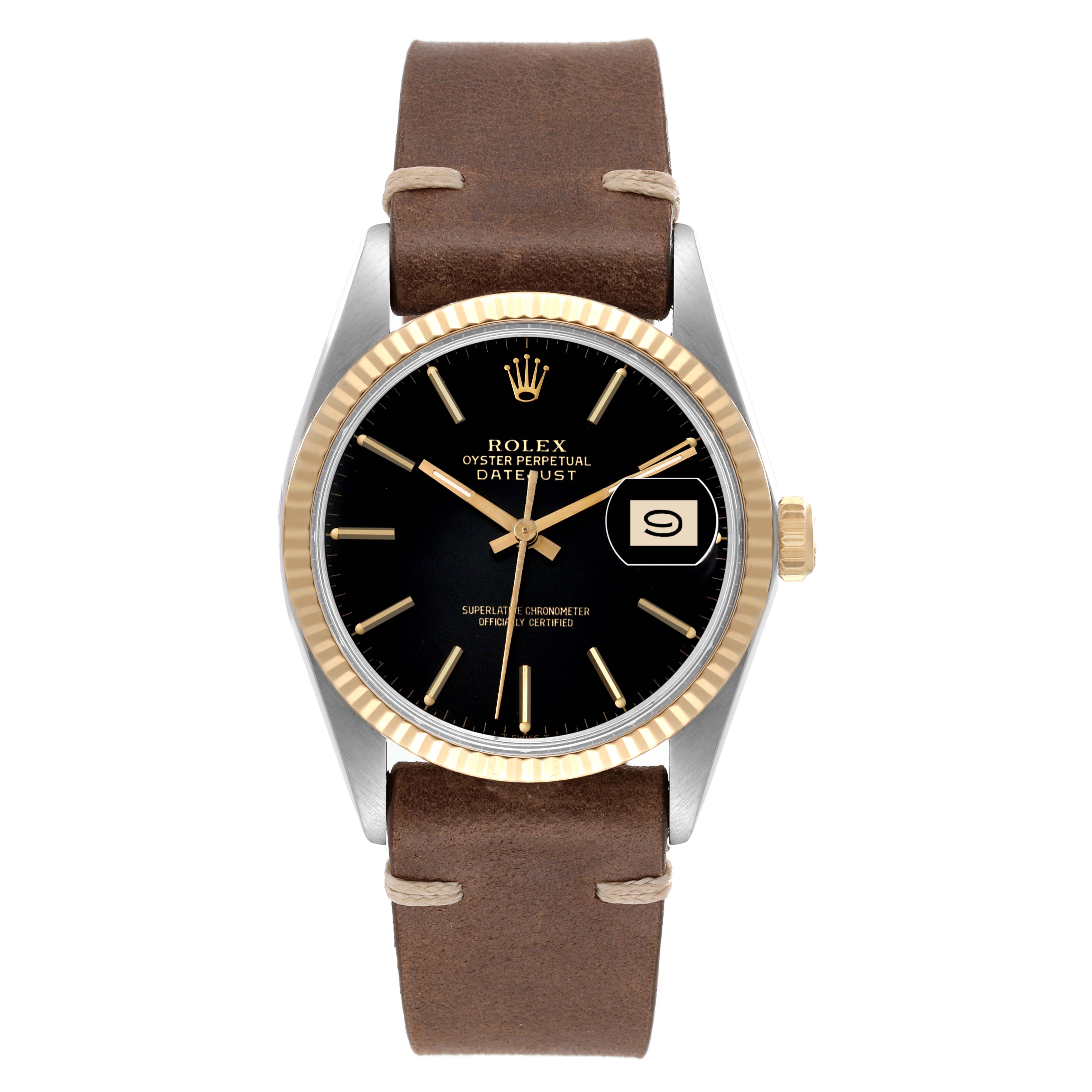 This image shows a frontal view of the Rolex Vintage Collection 16013 Men's Steel and Gold (two tone) Black Dial 16013 Men's Steel and Gold (two tone) Black Dial watch, highlighting its black dial, gold bezel, brown leather strap, and date display.