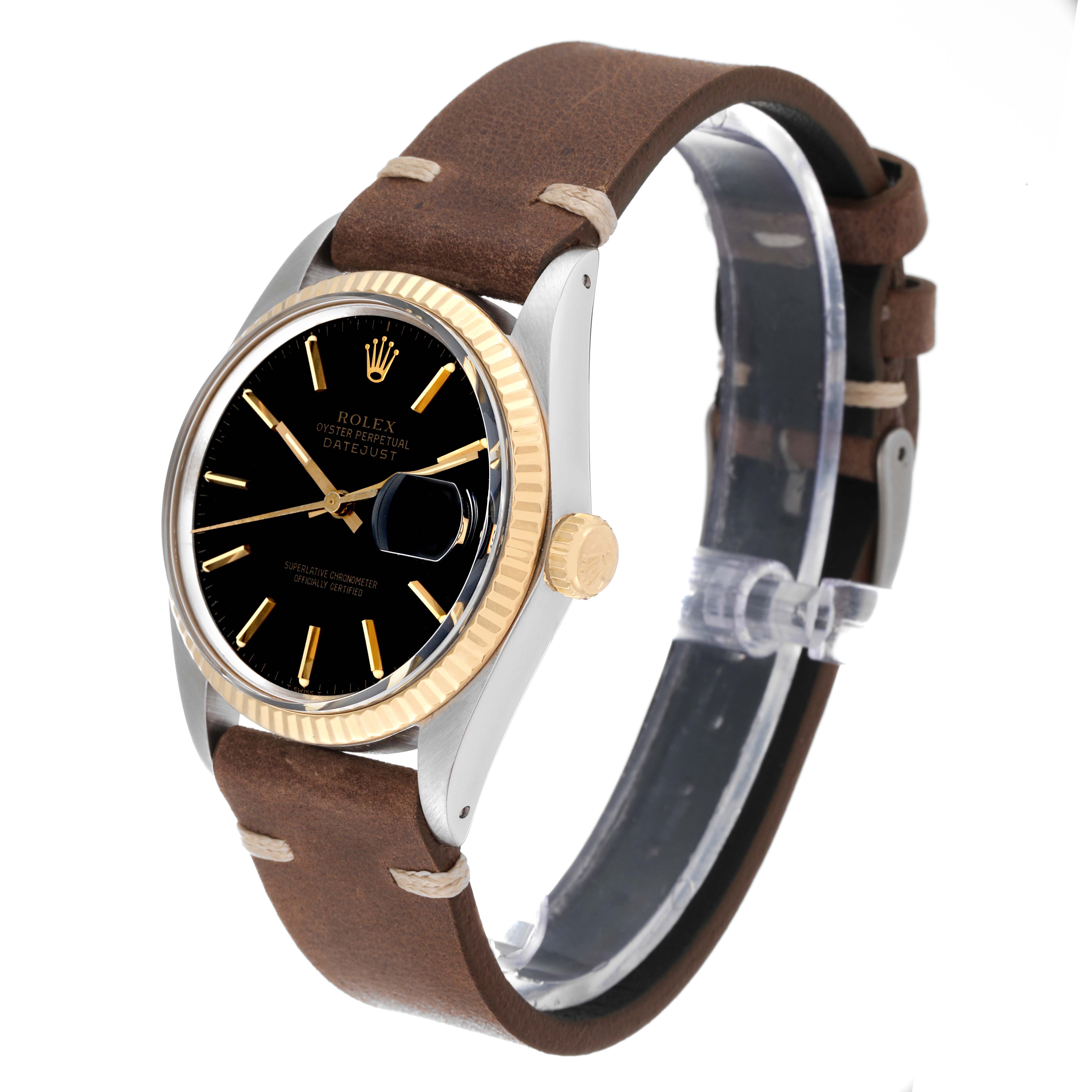 The Rolex Vintage Collection 16013 Men's Steel and Gold (two tone) Black Dial 16013 Men's Steel and Gold (two tone) Black Dial Datejust is shown at a slight side angle, highlighting the leather strap, black dial, and gold bezel.