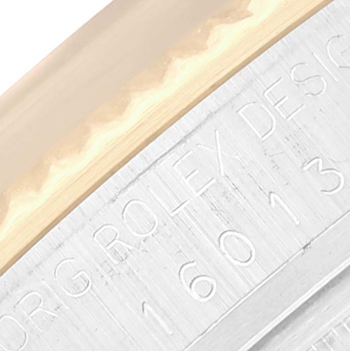 The image shows a close-up of the engraved bezel and case side of the Rolex Vintage Collection 16013 Men's Steel and Gold (two tone) Black Dial 16013 Men's Steel and Gold (two tone) Black Dial model with serial number visible.