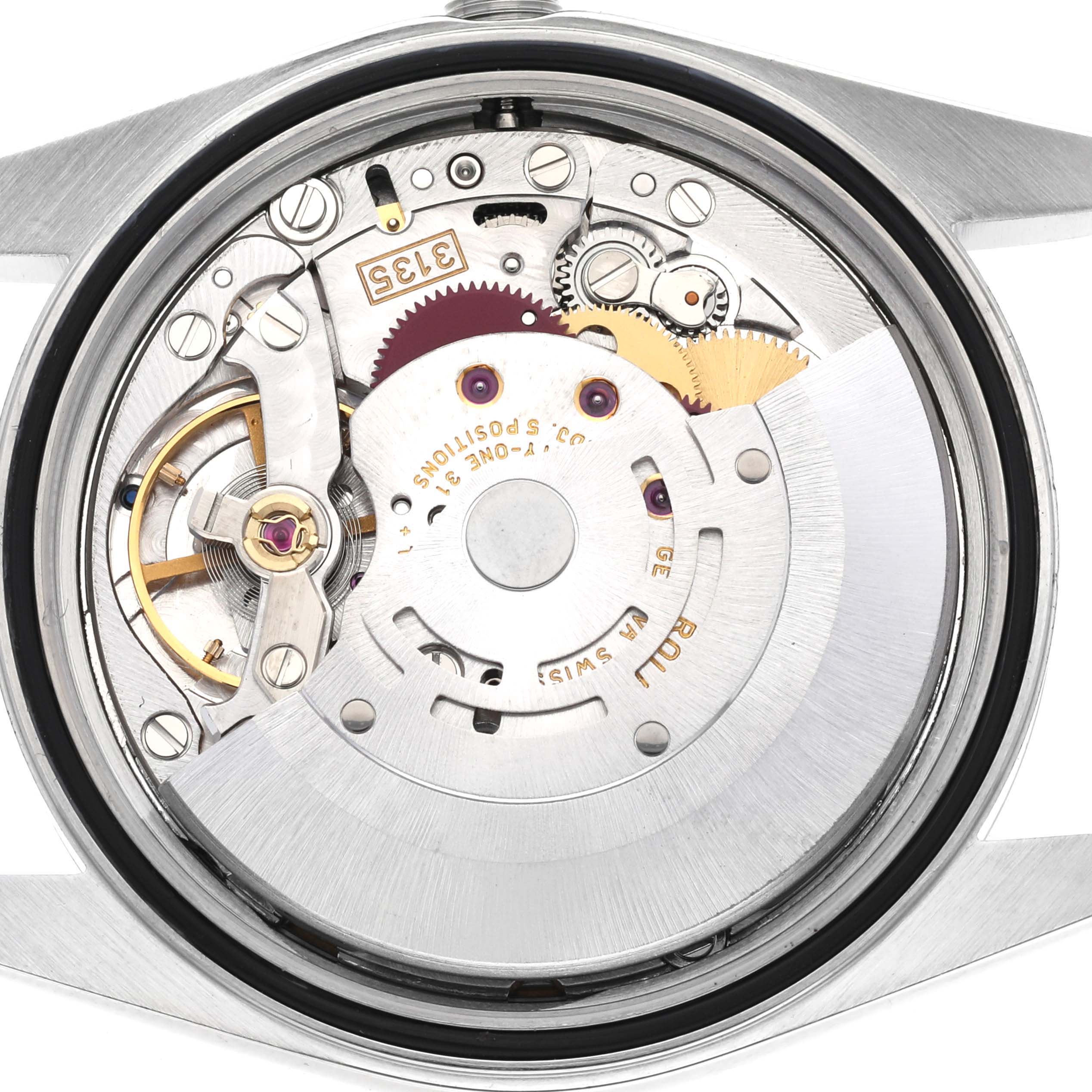 This image shows a close-up view of the exposed movement mechanism from the Rolex Datejust 16220 Men's Stainless Steel White Dial 16220 Men's Stainless Steel White Dial watch.