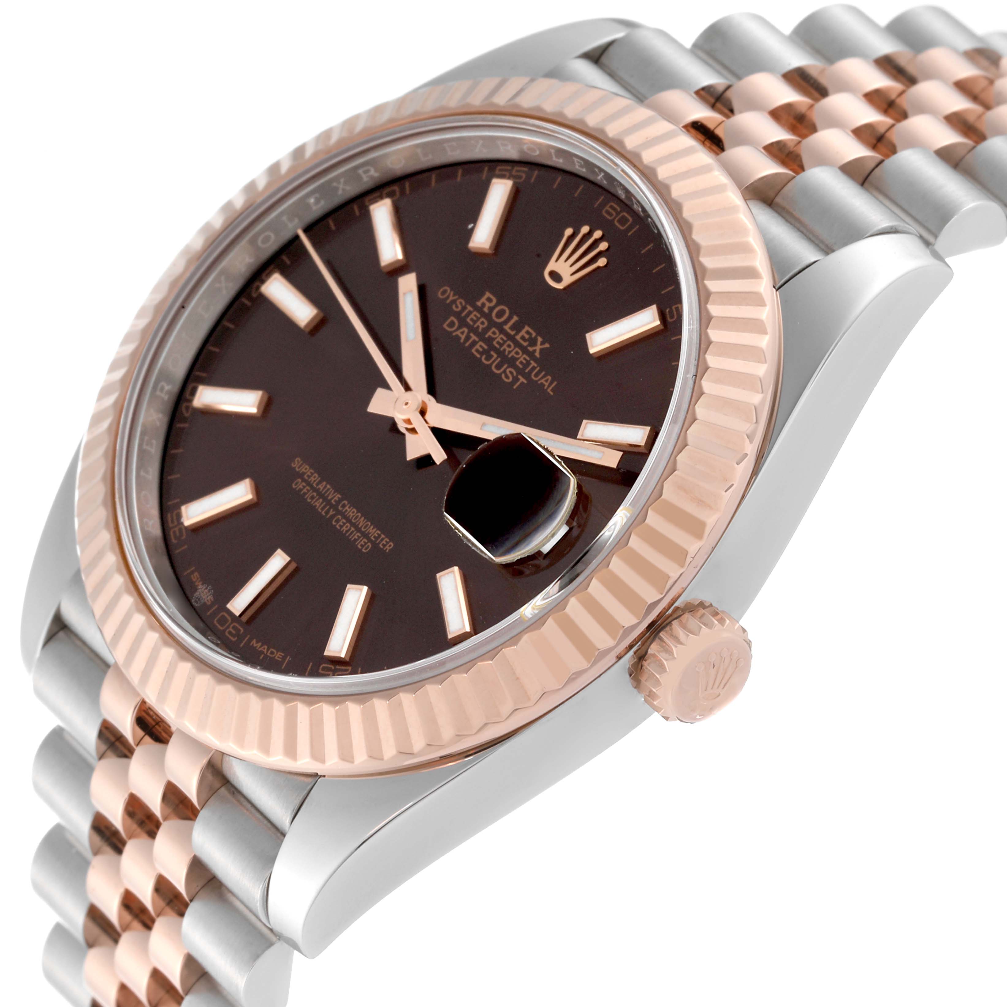 This image shows a close-up, angled view of the Rolex Datejust 41 126331 Men's Steel and Gold (two tone) Brown Dial 126331 Men's Steel and Gold (two tone) Brown Dial watch, highlighting the bezel, dial, hands, and crown.
