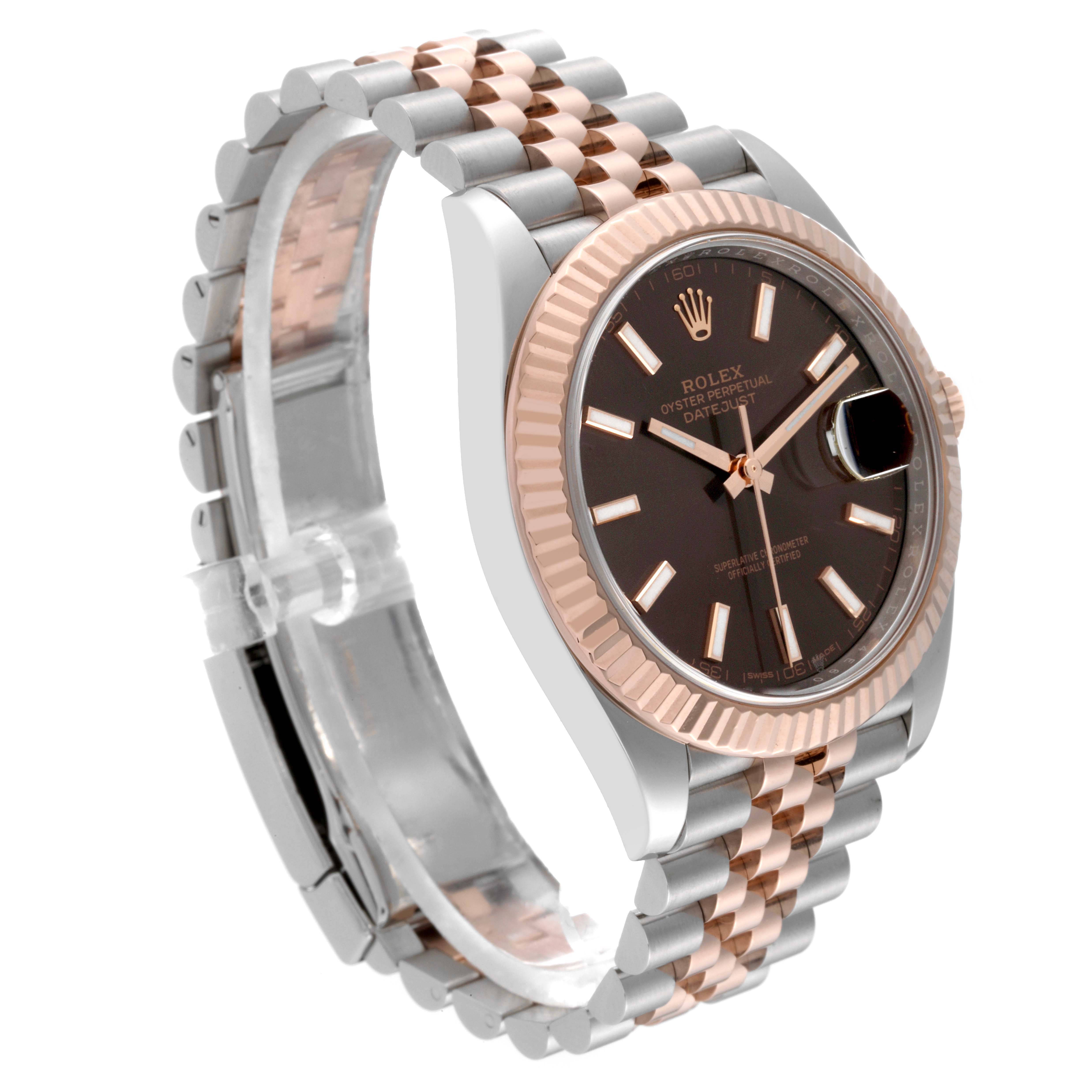 The image shows a Rolex Datejust 41 126331 Men's Steel and Gold (two tone) Brown Dial 126331 Men's Steel and Gold (two tone) Brown Dial watch from an angled view, highlighting its two-tone metal band, fluted bezel, and dial.