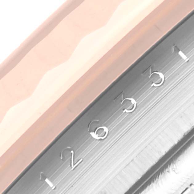 The image shows a close-up view of the bezel and inner dial of a Rolex Datejust 41 126331 Men's Steel and Gold (two tone) Brown Dial 126331 Men's Steel and Gold (two tone) Brown Dial watch, highlighting the date numbers.