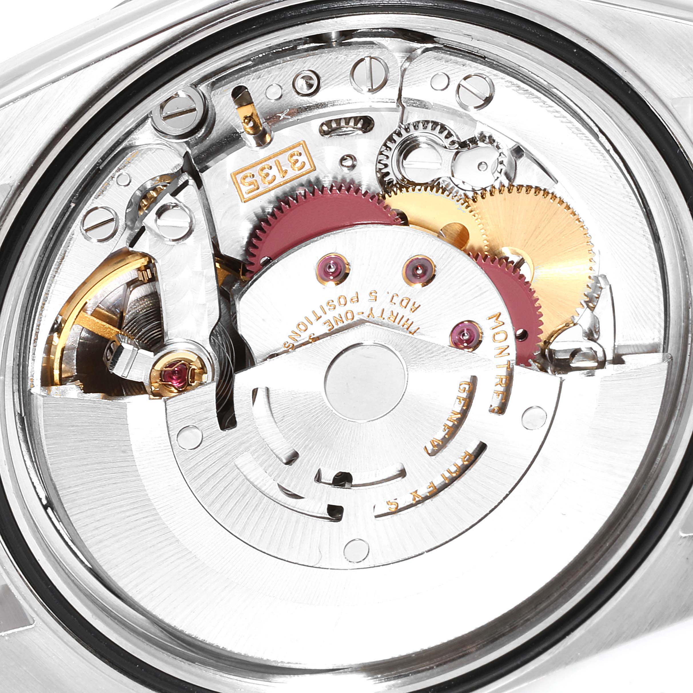 This image shows a close-up view of the movement and internal gears of a Rolex Datejust 16200 Men's Stainless Steel Black Dial 16200 Men's Stainless Steel Black Dial watch.