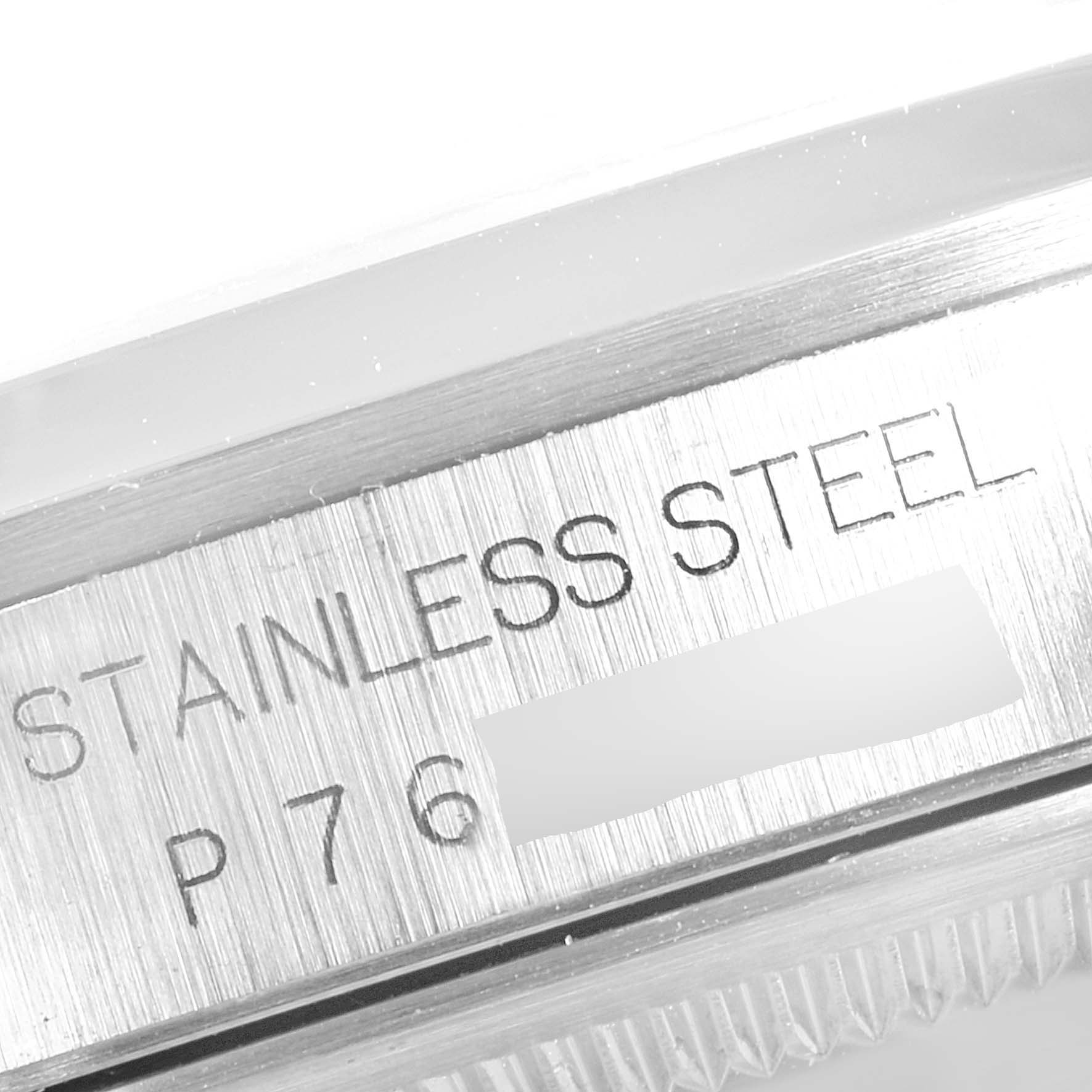 Close-up of the case side of a Rolex Datejust 16200 Men's Stainless Steel Black Dial 16200 Men's Stainless Steel Black Dial watch showing "STAINLESS STEEL" engraving.