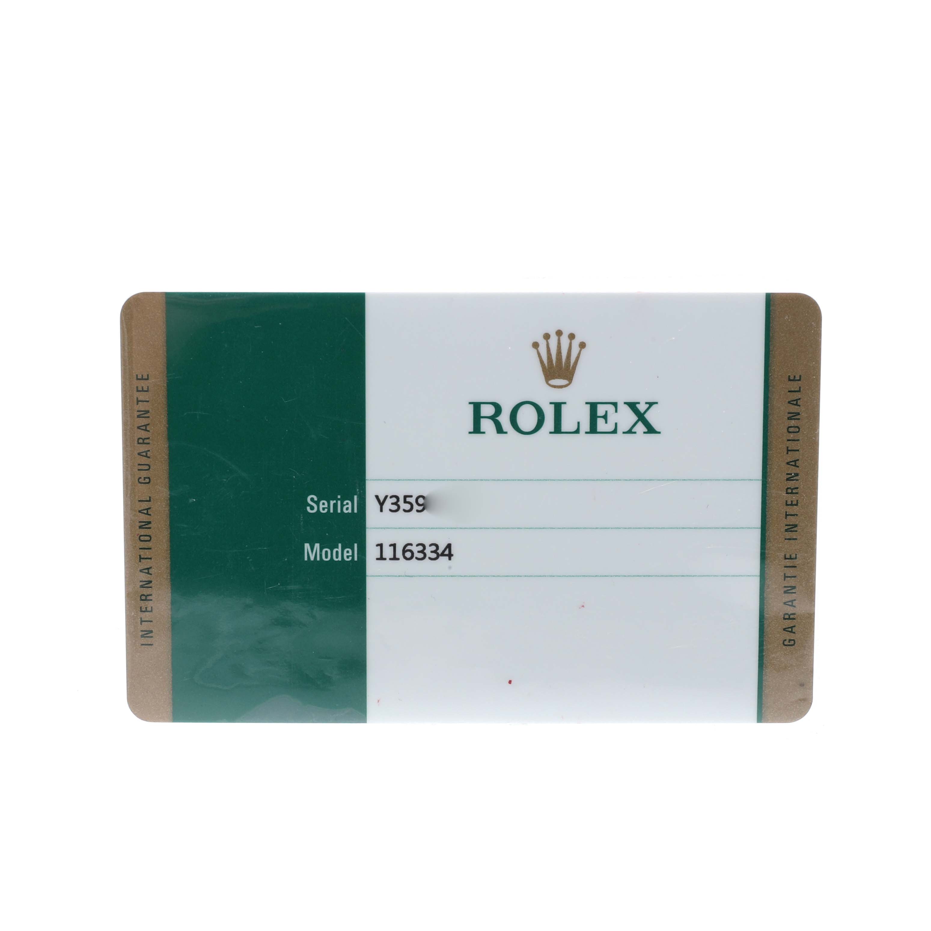 This image shows the international guarantee card for a Rolex Datejust 41 116334 Men's Stainless Steel Silver Dial, displaying the serial and model number.