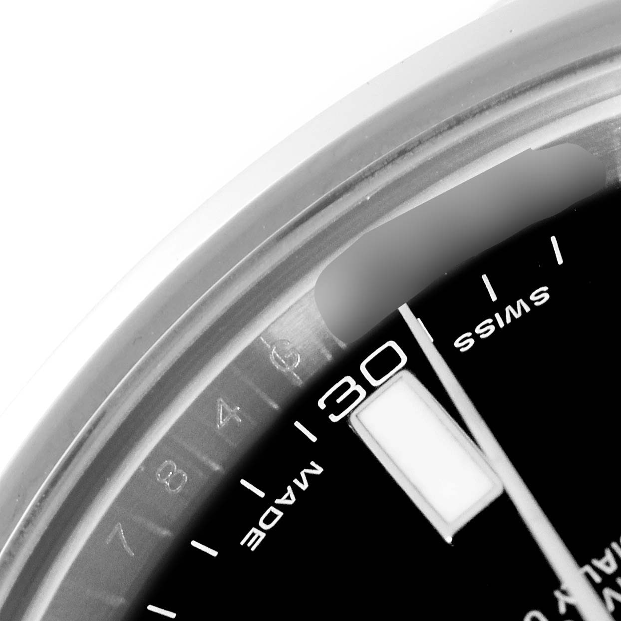 This image shows a close-up of the Datejust 41 by Rolex, focusing on the edge of the dial with numerals and the 30-minute marker.