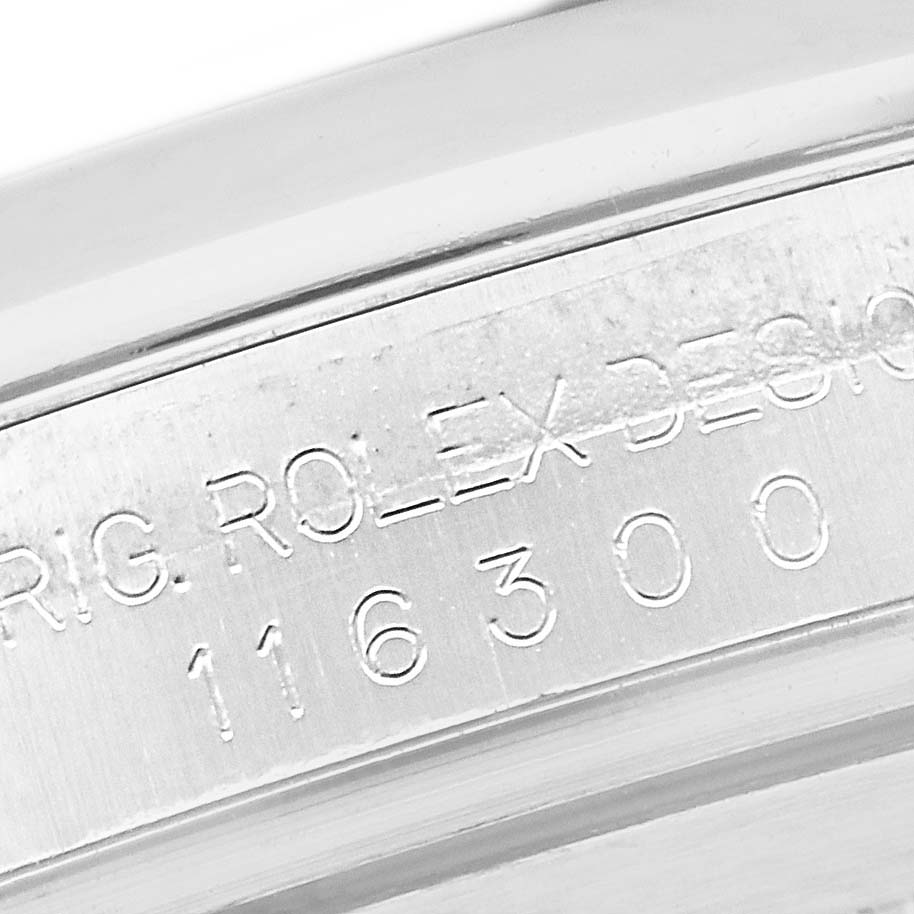 This image shows a close-up angle of the serial and model numbers engraved on the Rolex Datejust 41 116300 Men's Stainless Steel Black Dial 116300 Men's Stainless Steel Black Dial watch case.