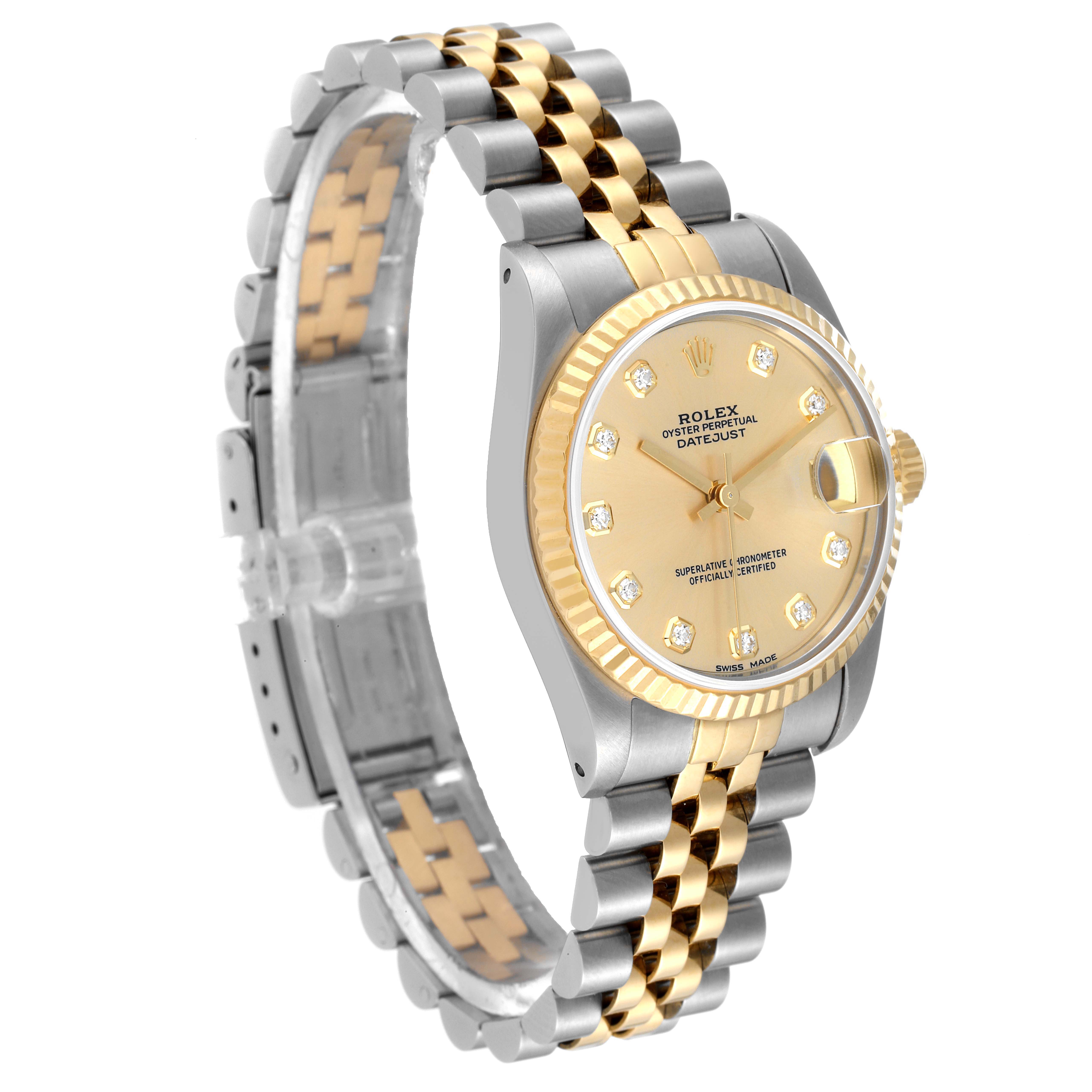 The image shows a side angle of the Rolex Mid-Size 68273 Women
s Steel and Gold (two tone) Champagne Dial 68273 Women
s Steel and Gold (two tone) Champagne Dial Datejust, highlighting the watch face and two-tone bracelet.