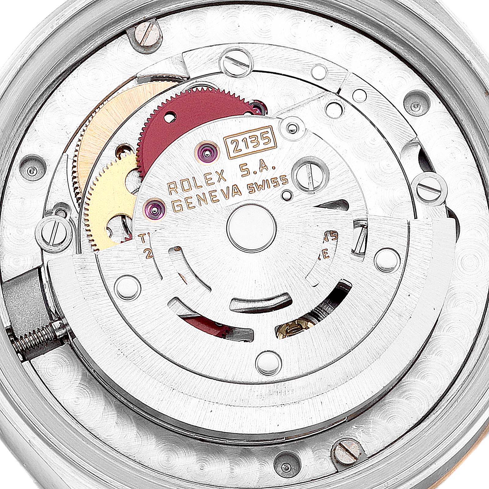 The image shows the intricate internal mechanism of a Rolex Mid-Size 68273 Women
s Steel and Gold (two tone) Champagne Dial 68273 Women
s Steel and Gold (two tone) Champagne Dial model watch viewed from the back.