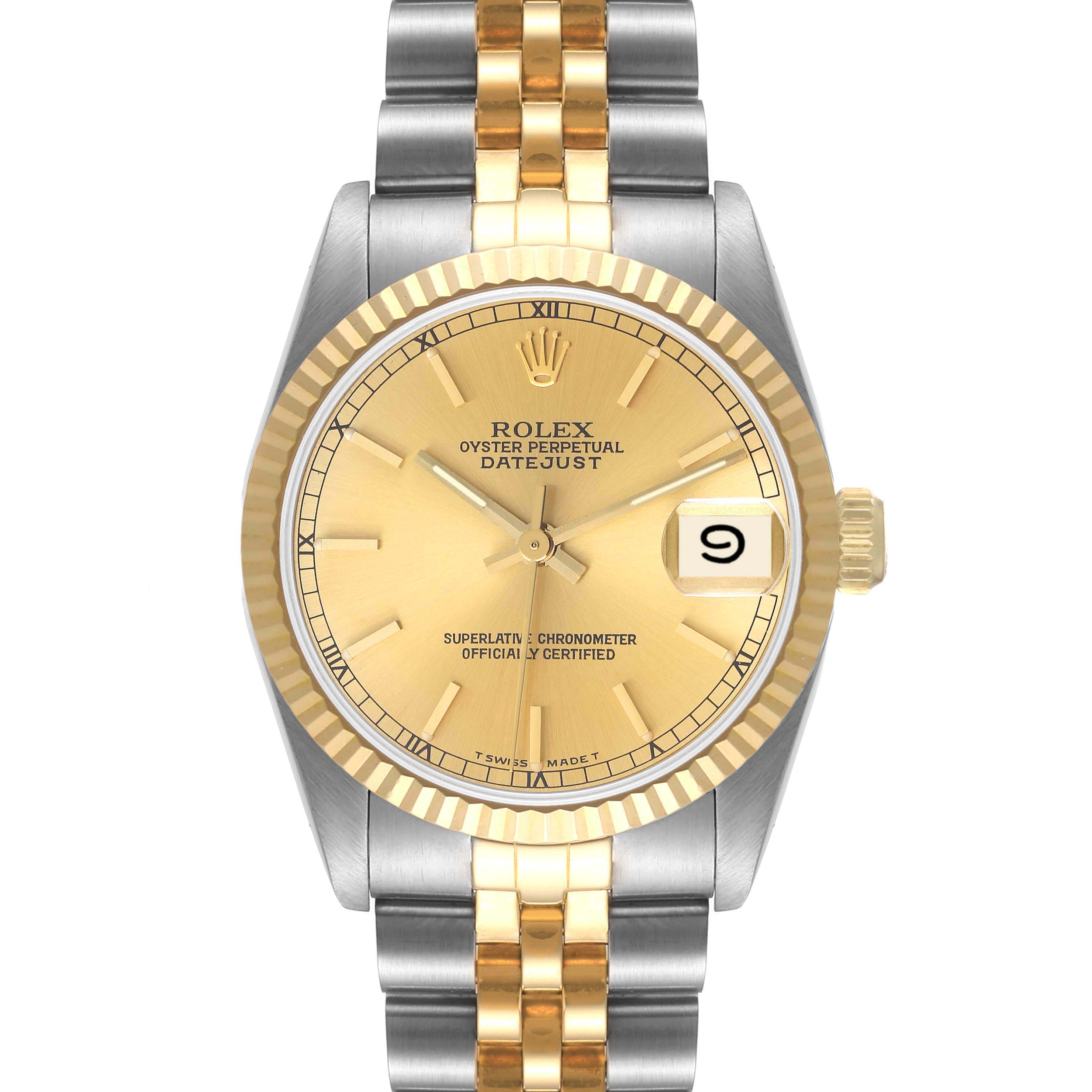 This Rolex Mid-Size 68273 Women
s Steel and Gold (two tone) Champagne Dial 68273 Women
s Steel and Gold (two tone) Champagne Dial Datejust watch is shown from a top-down angle, highlighting the face, bezel, and bicolor bracelet.