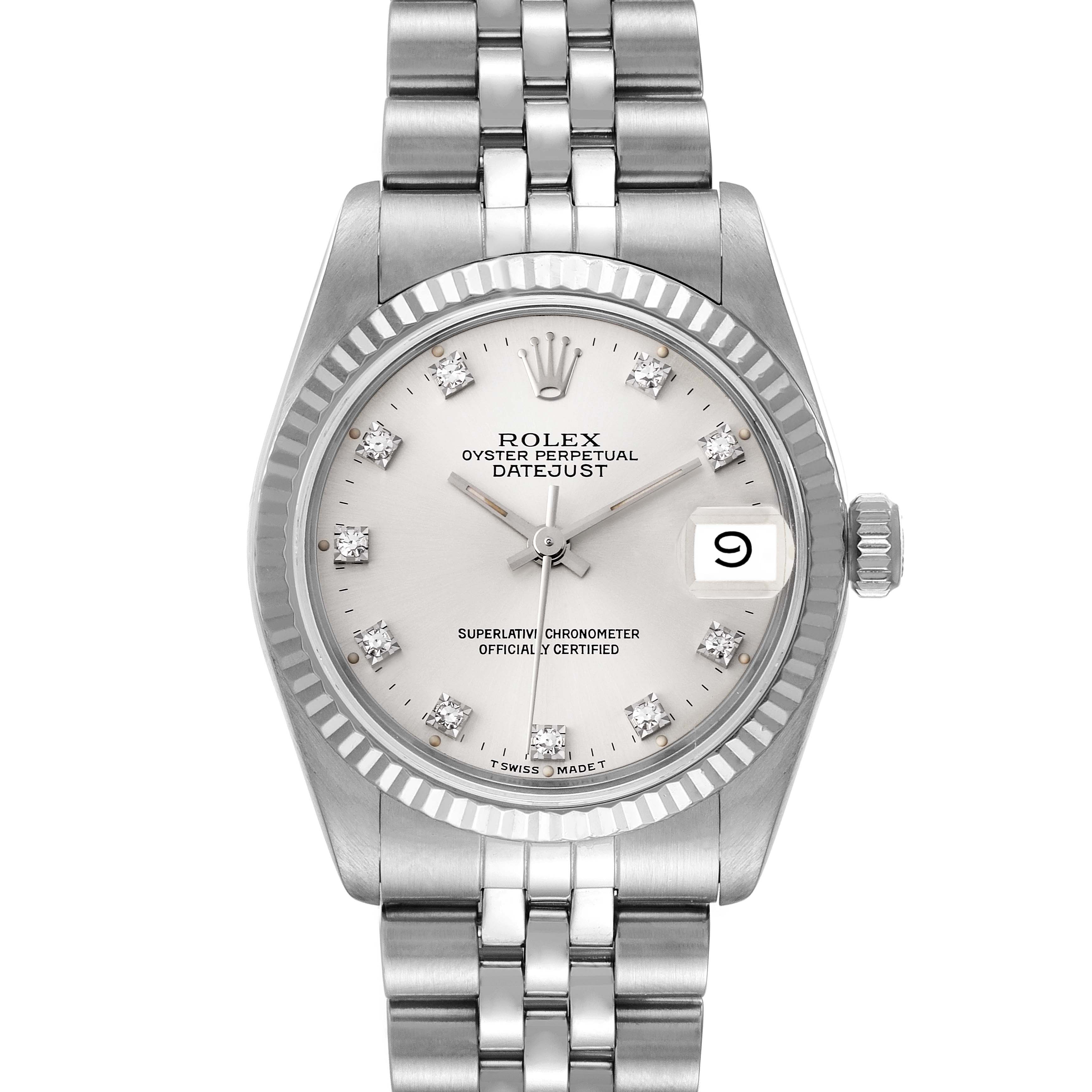 The image shows a front view of a Rolex Datejust Mid-Size watch featuring a silver dial, fluted bezel, and steel bracelet.