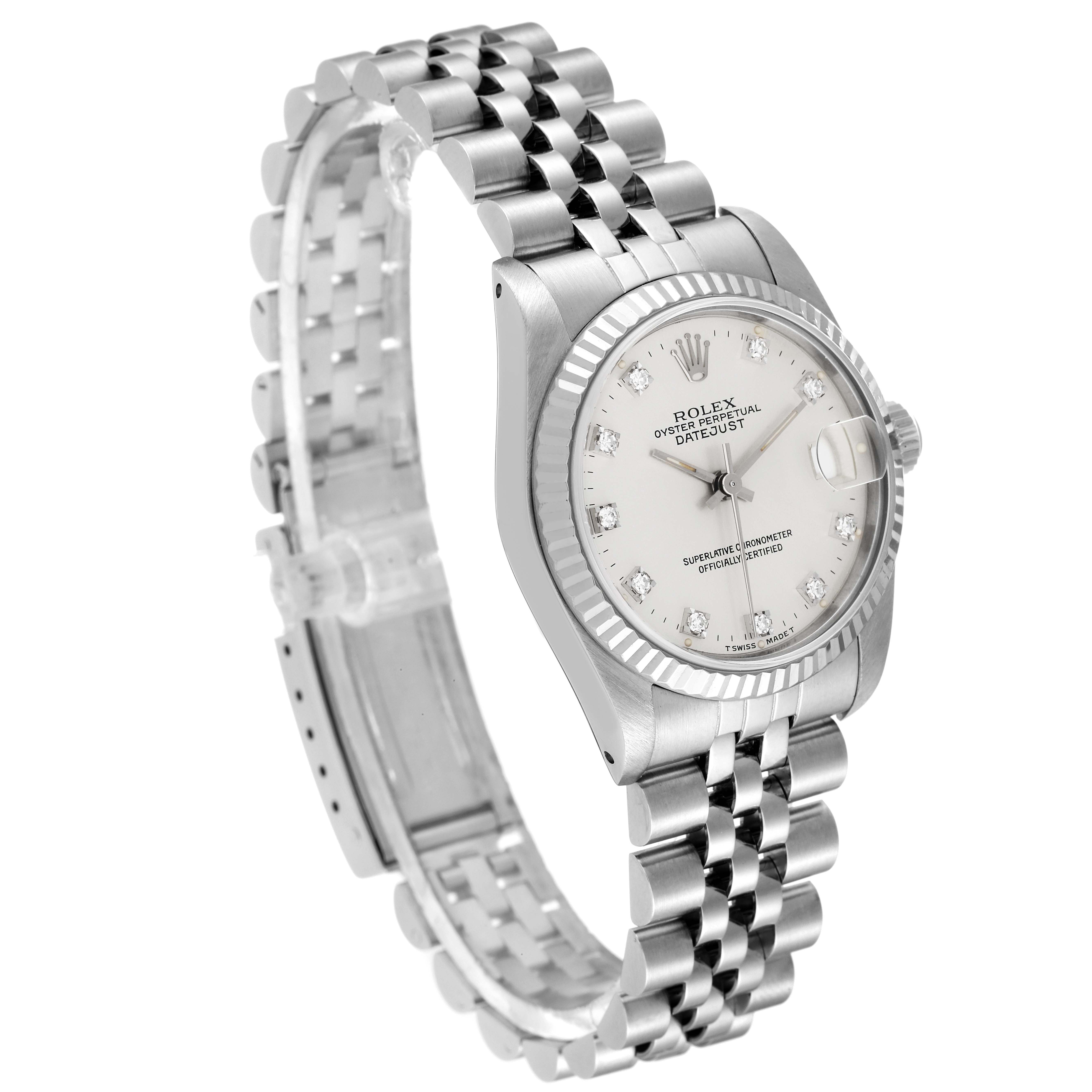 The image shows a Rolex Mid-Size 68274 Women
s Stainless Steel Silver Dial 68274 Women
s Stainless Steel Silver Dial Oyster Perpetual Datejust watch, highlighting its dial, case, and bracelet at an angled view.