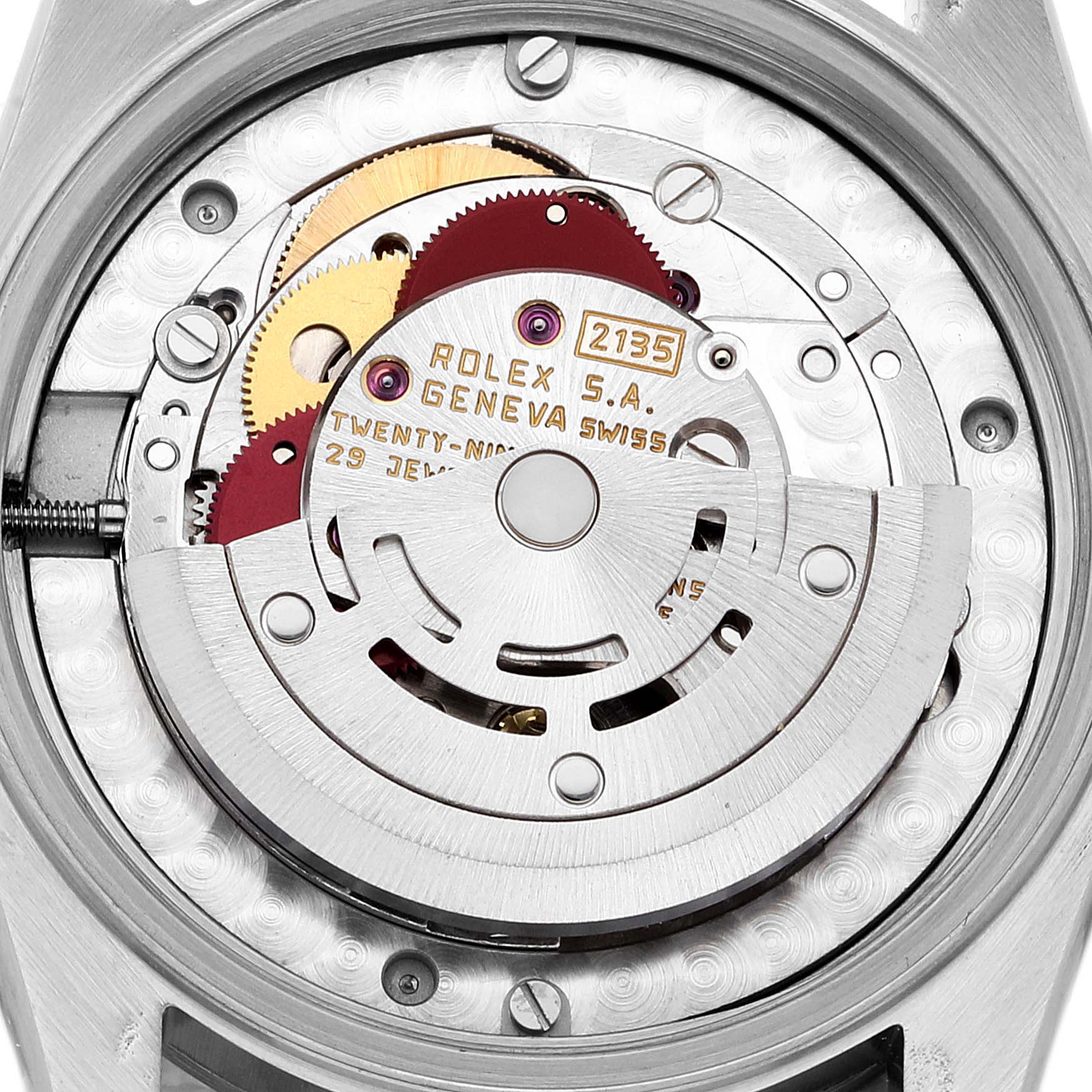 This image shows the inner mechanism of a Rolex Mid-Size 68274 Women
s Stainless Steel Silver Dial 68274 Women
s Stainless Steel Silver Dial model, specifically the movement part labeled with "2135."