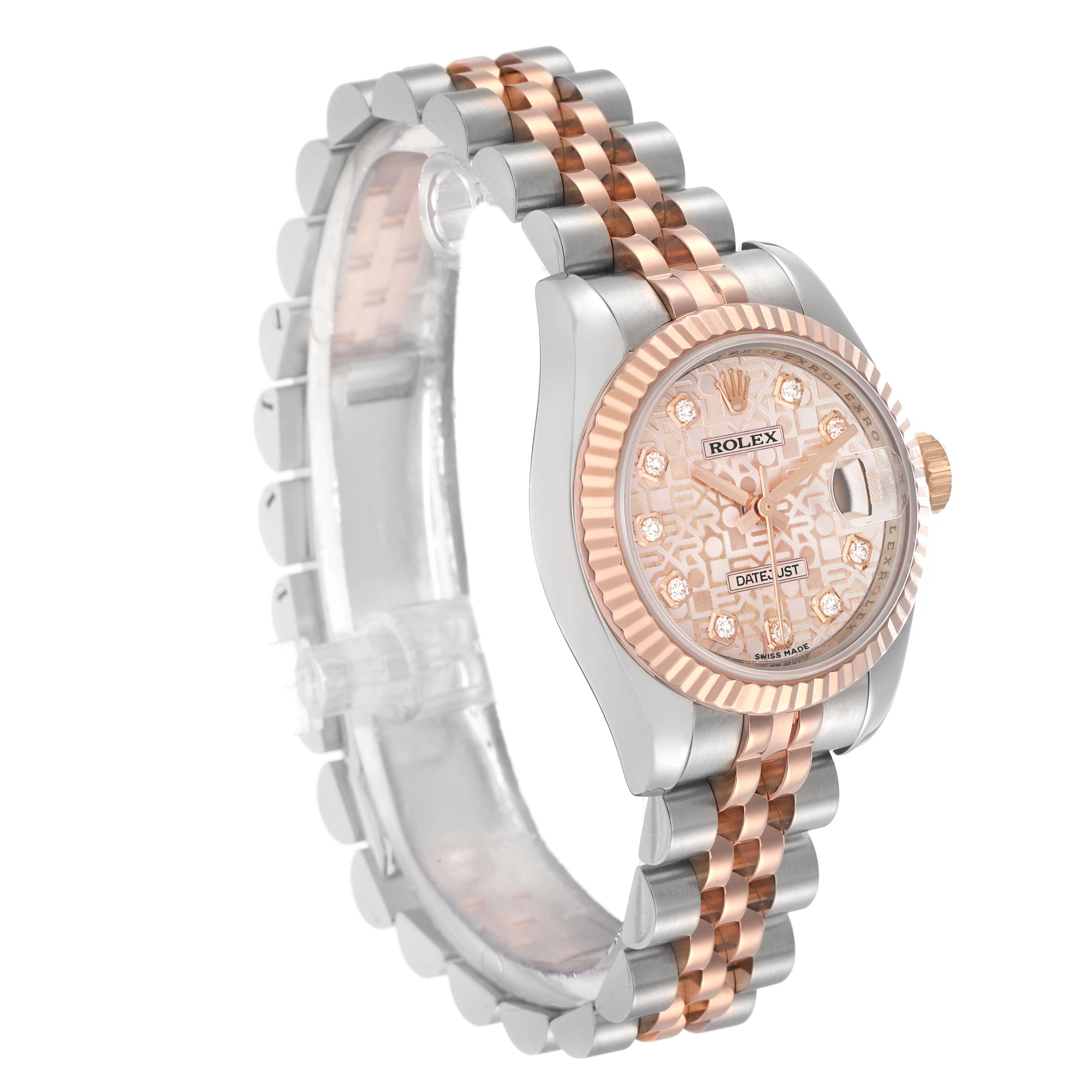 The Rolex Datejust 179171 Women
s Steel and Gold (two tone) Pink Dial watch is shown from a three-quarter angle, highlighting the two-tone bracelet, fluted bezel, and patterned dial.