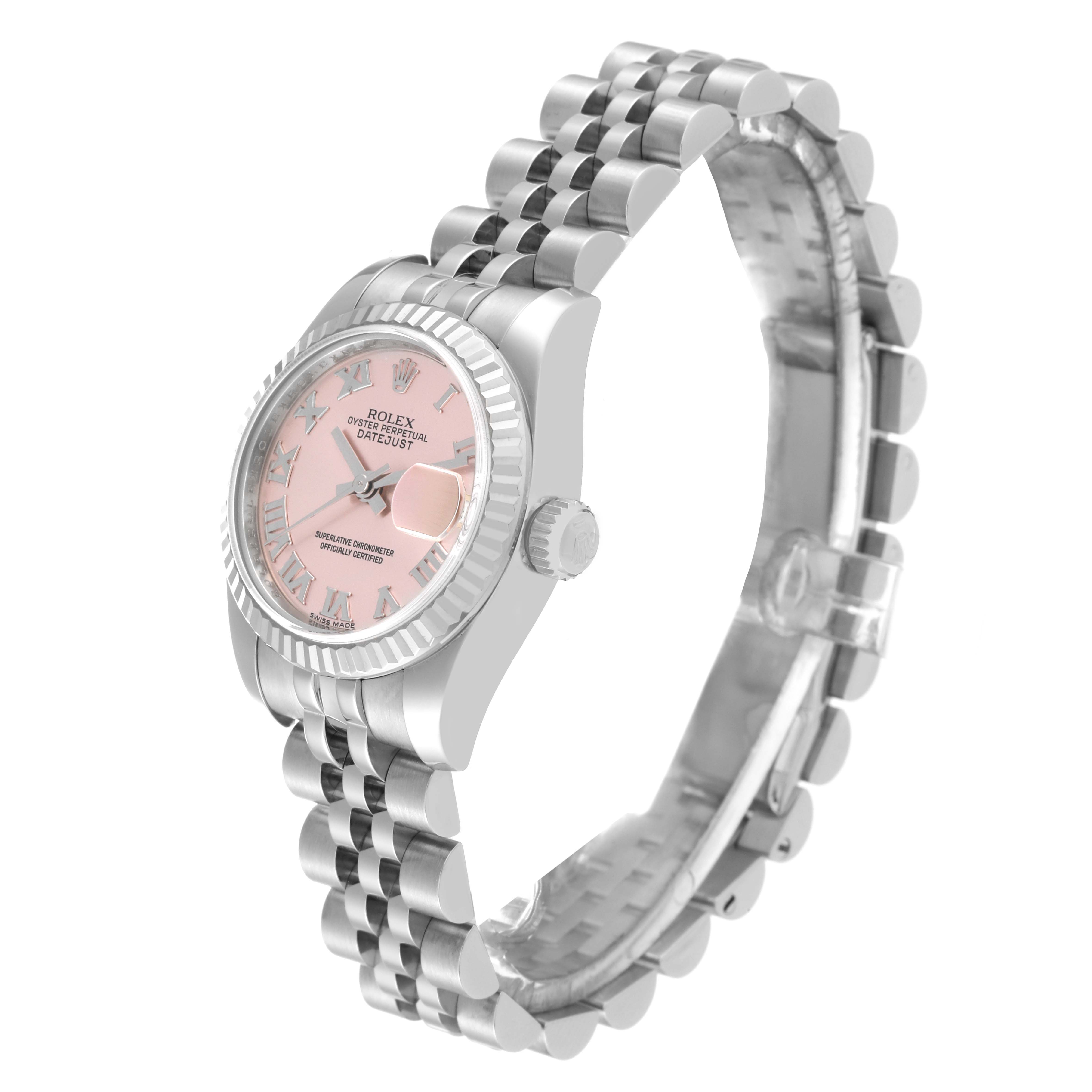 The image shows a Rolex Datejust 179174 Women's Stainless Steel Pink Dial 179174 Women's Stainless Steel Pink Dial watch at a three-quarter angle, displaying the face, bezel, crown, and bracelet.
