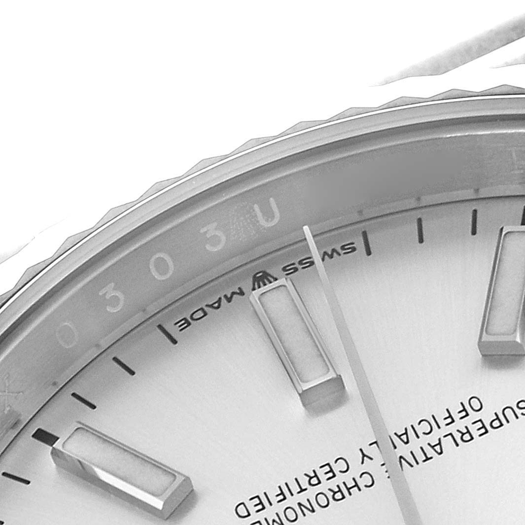 The image shows a close-up of the dial and bezel of a Rolex Datejust 126234 Men's Stainless Steel Silver Dial, highlighting markers and the text "Swiss Made."