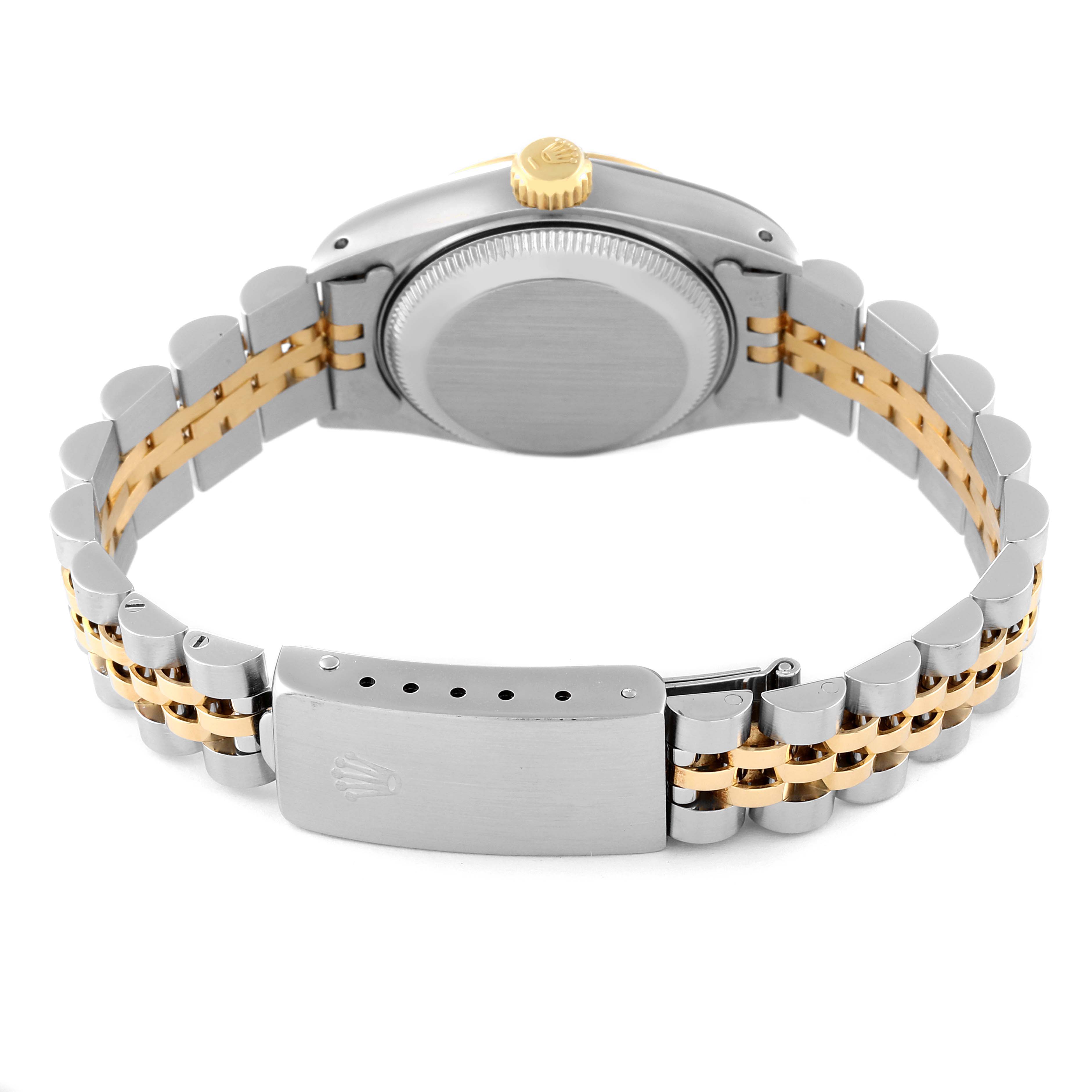 The image shows the backside of a Rolex Datejust 69173 Women's Steel and Gold (two tone) Beige Dial 69173 Women's Steel and Gold (two tone) Beige Dial watch and its bracelet with two-tone links and a clasp featuring the Rolex logo.