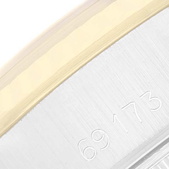 The image shows a close-up of the side of a Rolex Datejust 69173 Women's Steel and Gold (two tone) Beige Dial 69173 Women's Steel and Gold (two tone) Beige Dial watch, highlighting the engraved model number "69173."