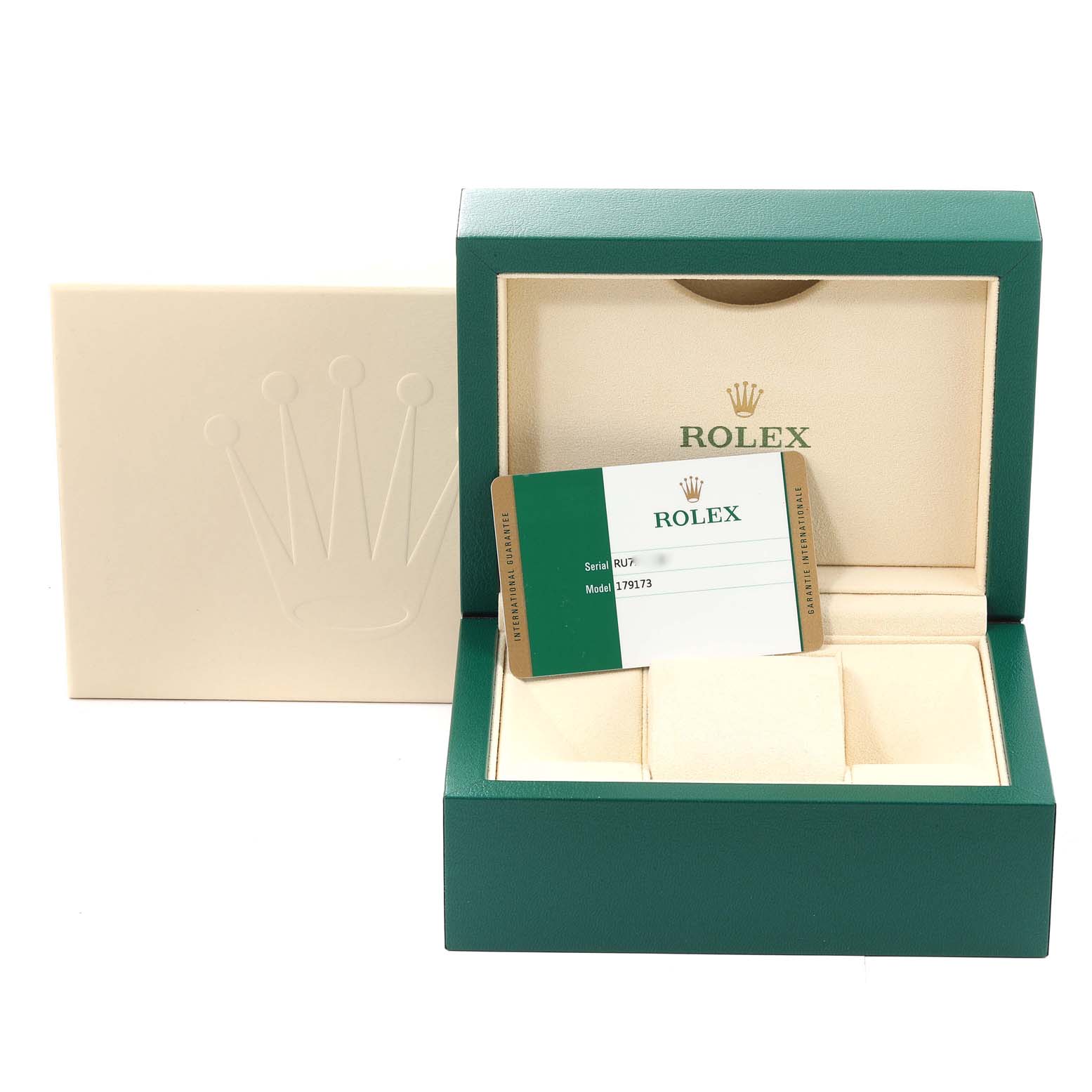 The image shows a Rolex Datejust 179173 Women's Steel and Gold (two tone) Champagne Dial 179173 Women's Steel and Gold (two tone) Champagne Dial watch box at a slight angle with a card containing the model and serial number.