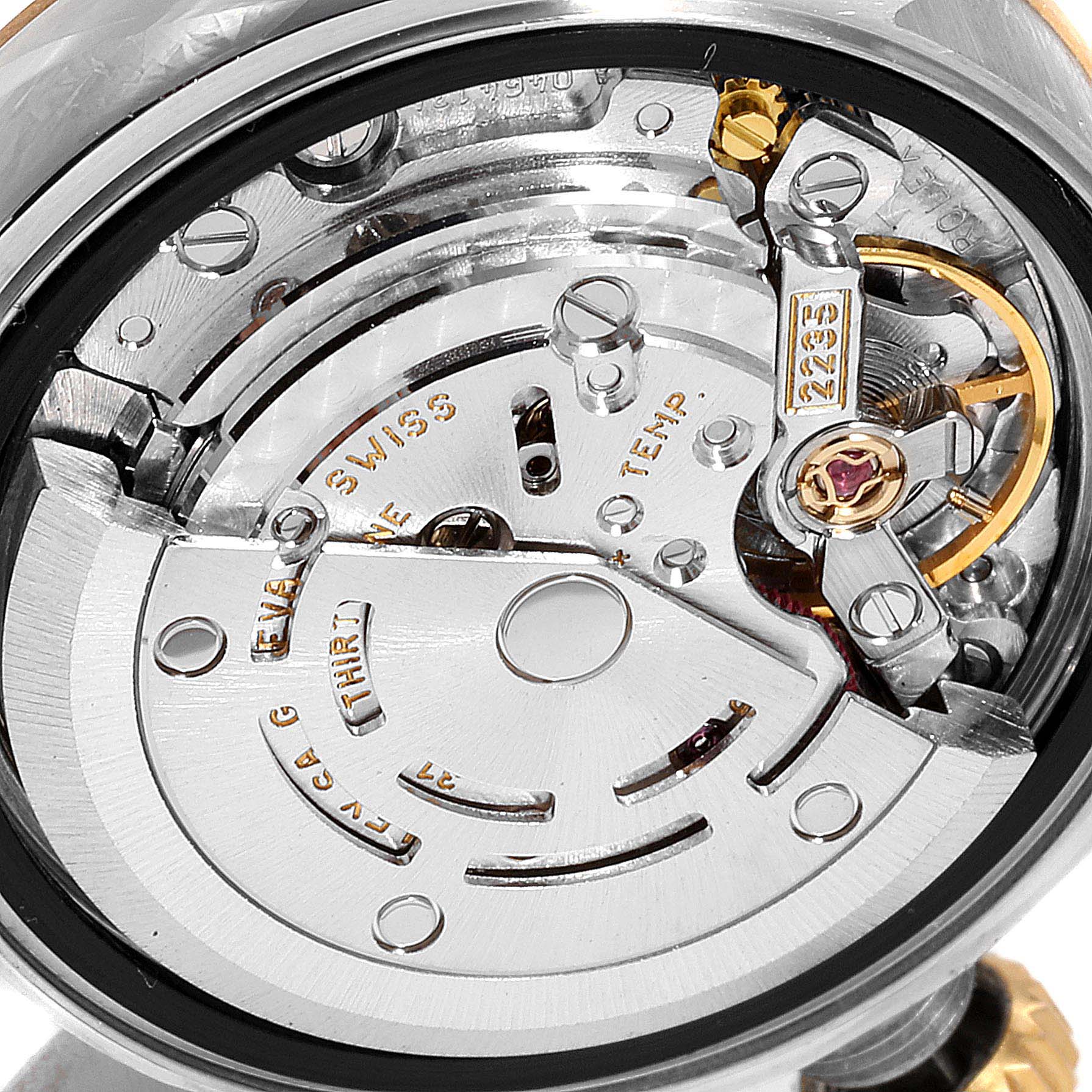 This is a close-up of the internal mechanical movement of a Rolex Datejust 79173 Women's Steel and Gold (two tone) Champagne Dial 79173 Women's Steel and Gold (two tone) Champagne Dial watch.