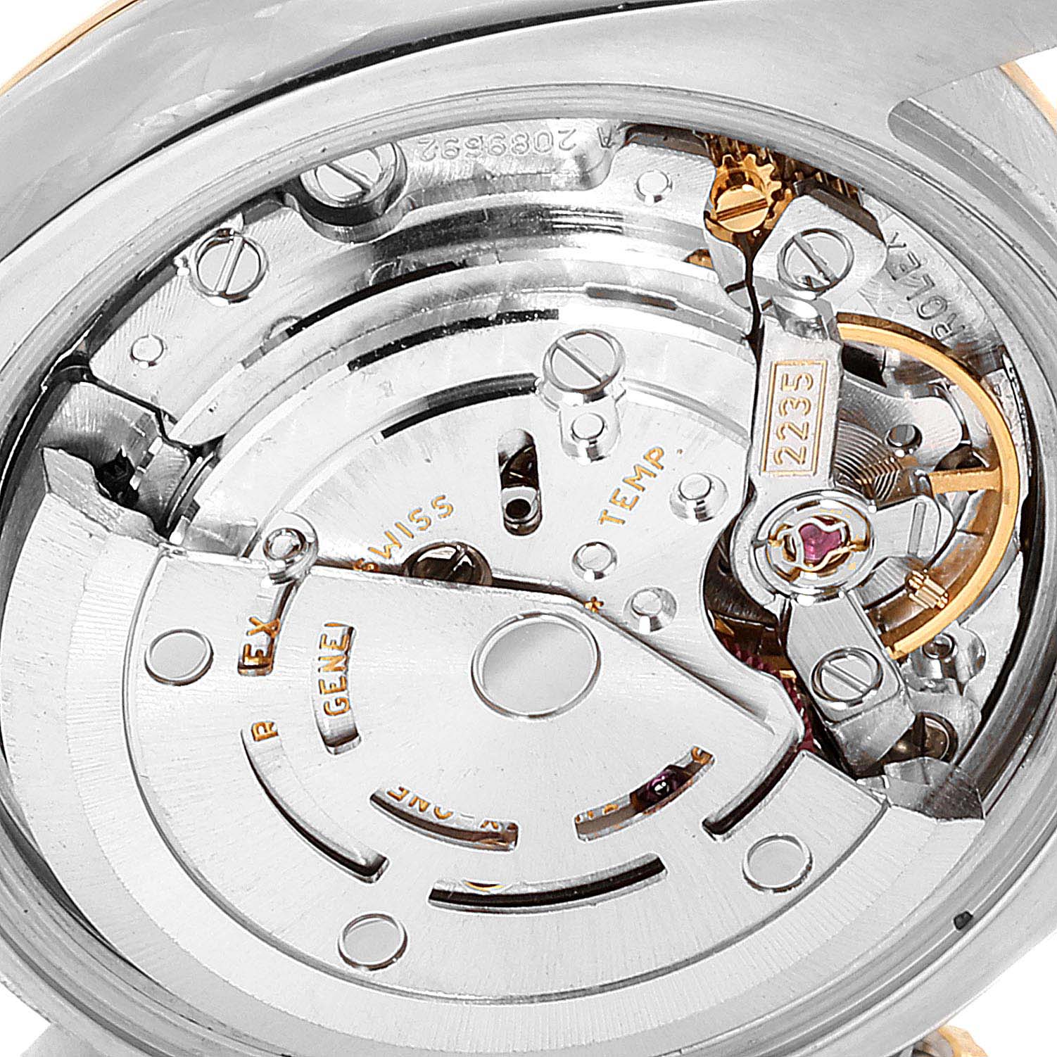 This image shows a close-up view of the movement and internal components of a Rolex Datejust 179173 Women's Steel and Gold (two tone) Mother of Pearl Dial 179173 Women's Steel and Gold (two tone) Mother of Pearl Dial watch.