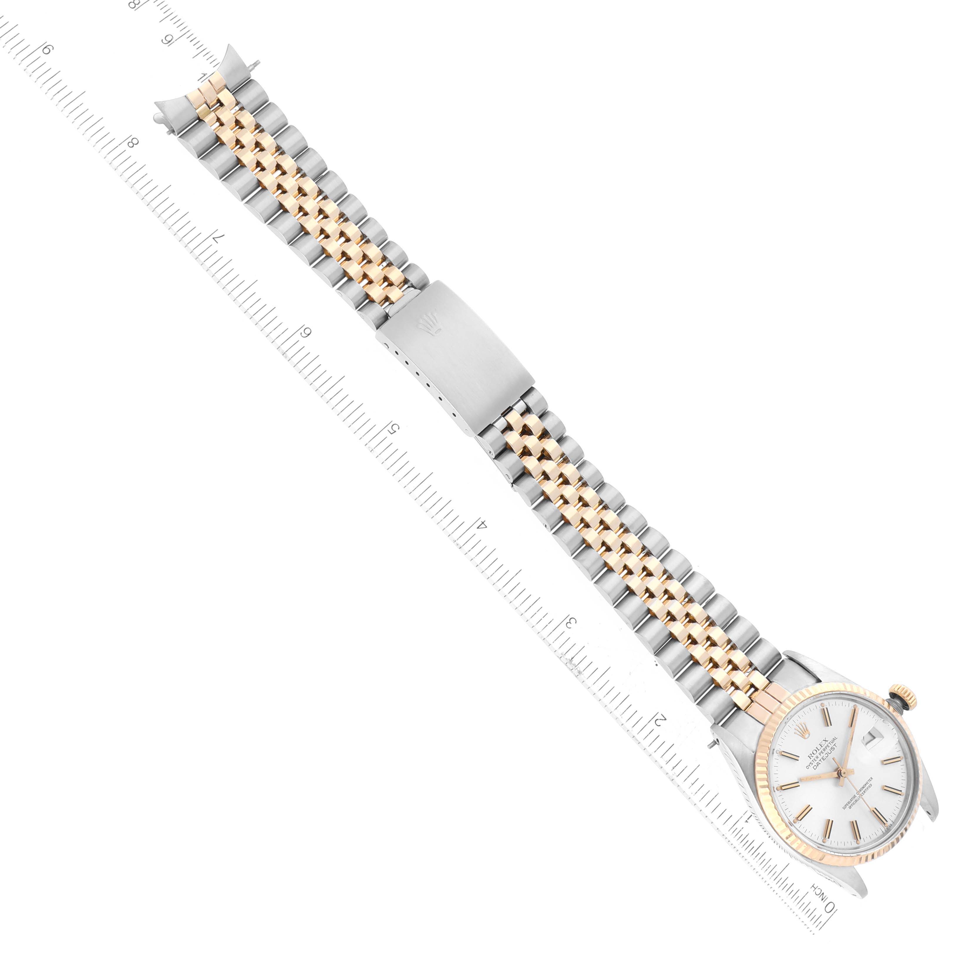 This image shows a top-down view of a Vintage Collection Rolex watch, highlighting its face, bezel, and band.