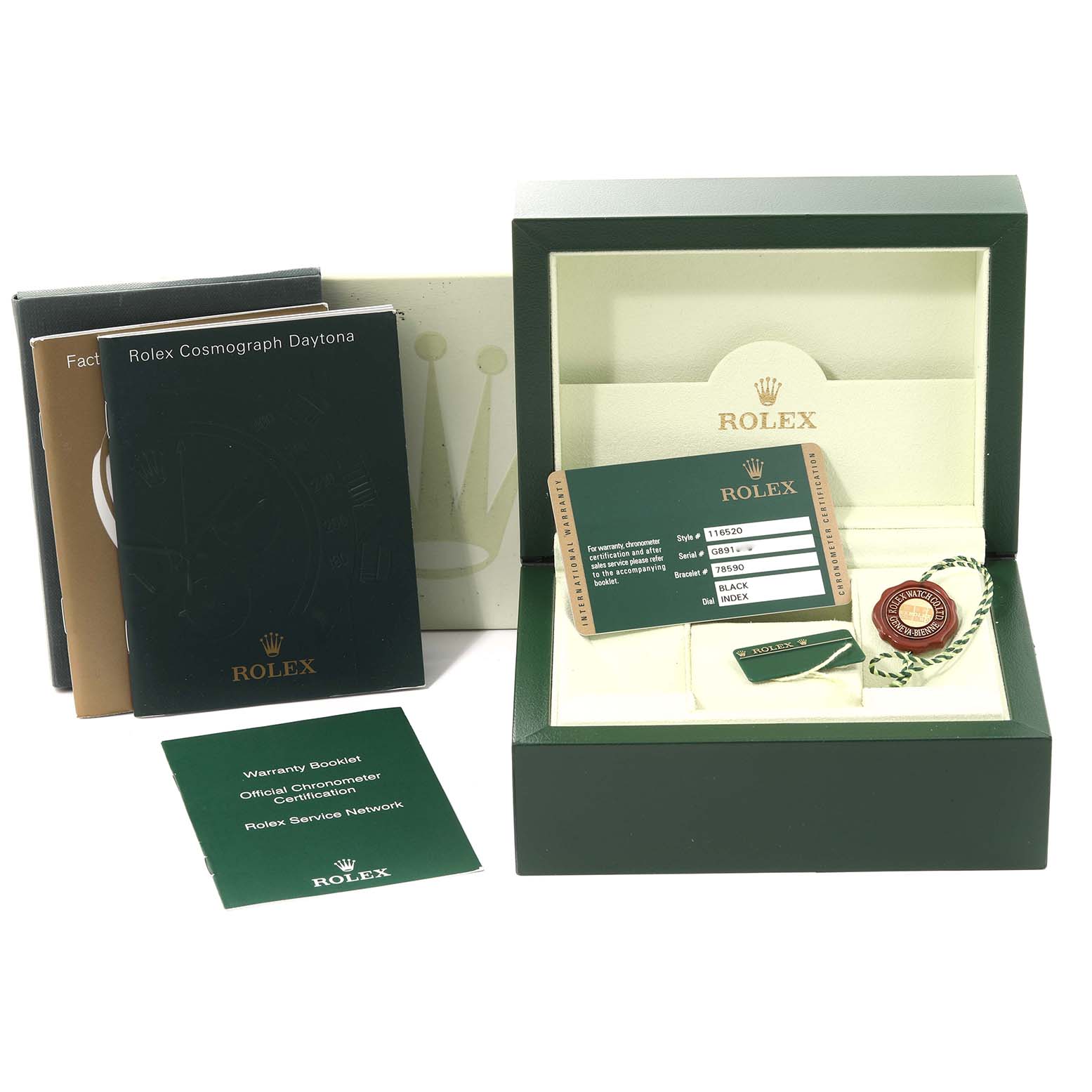 The image shows the packaging, manuals, warranty booklets, and tags for a Rolex Daytona 116520 Men's Stainless Steel Black Dial 116520 Men's Stainless Steel Black Dial watch from a front view.