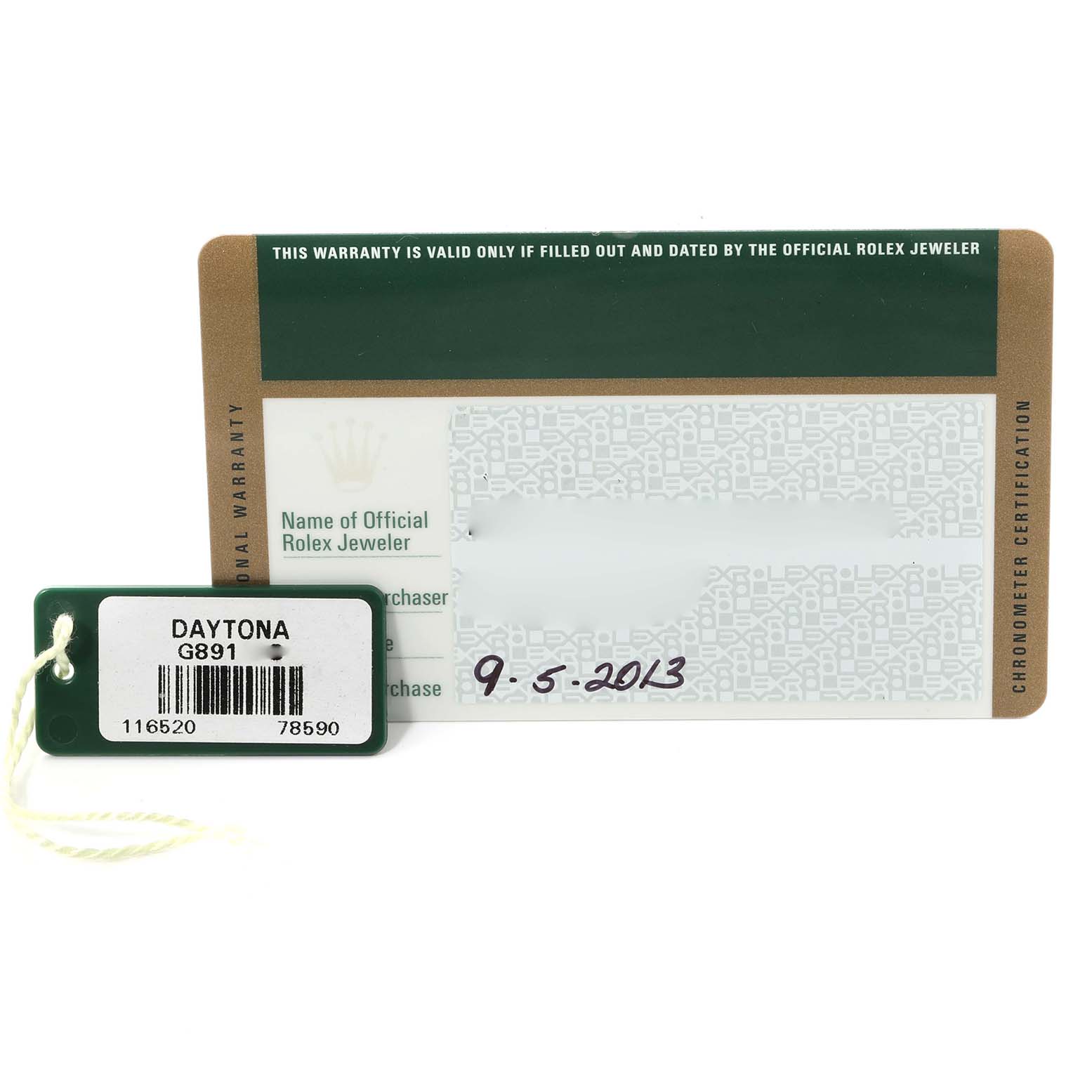 The image shows a warranty card and a green tag for the Rolex Daytona 116520 Men's Stainless Steel Black Dial 116520 Men's Stainless Steel Black Dial watch model.