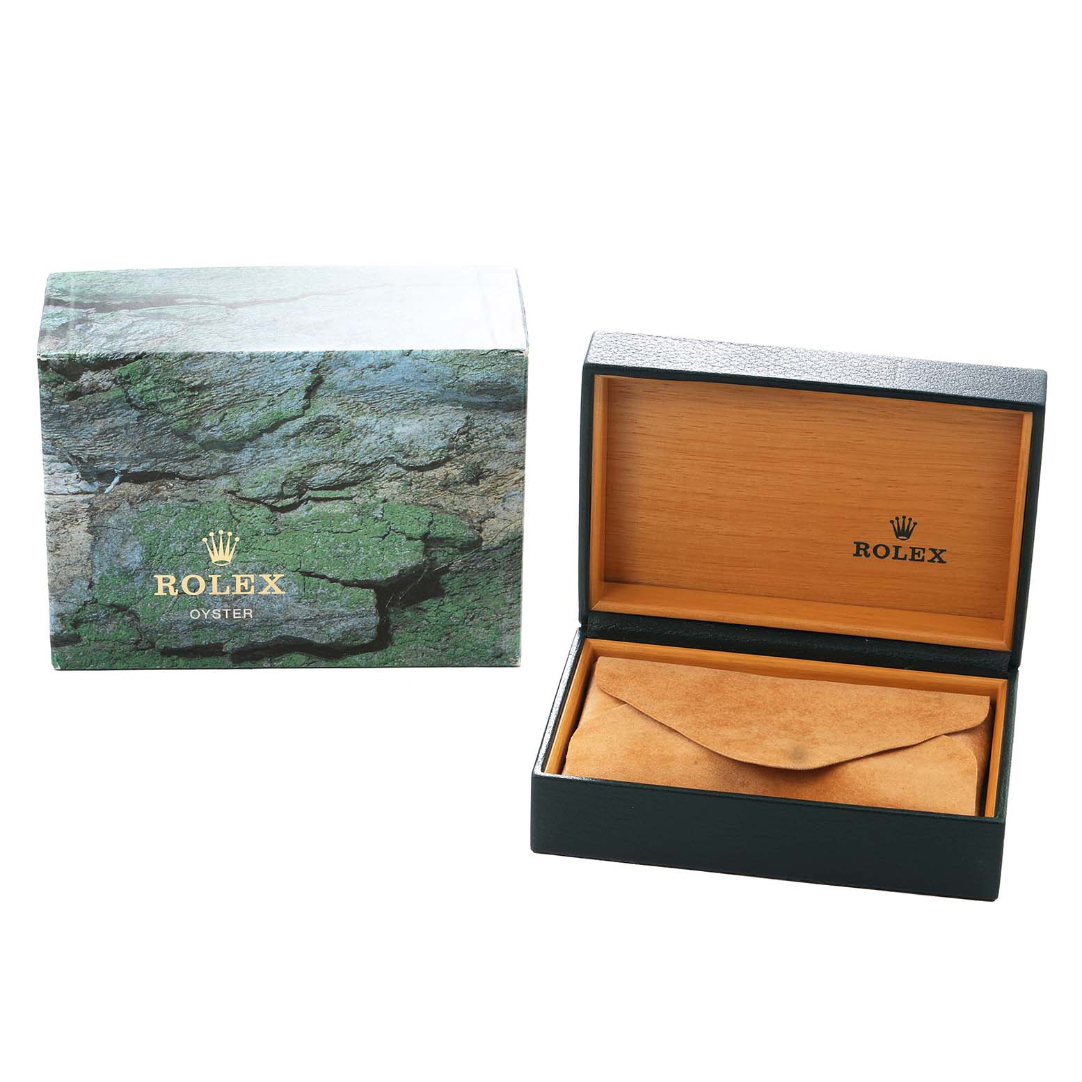 The image shows the Rolex Daytona 16520 Men
s Stainless Steel White Dial watch box and packaging at an angle, featuring the outer box and an open inner box.