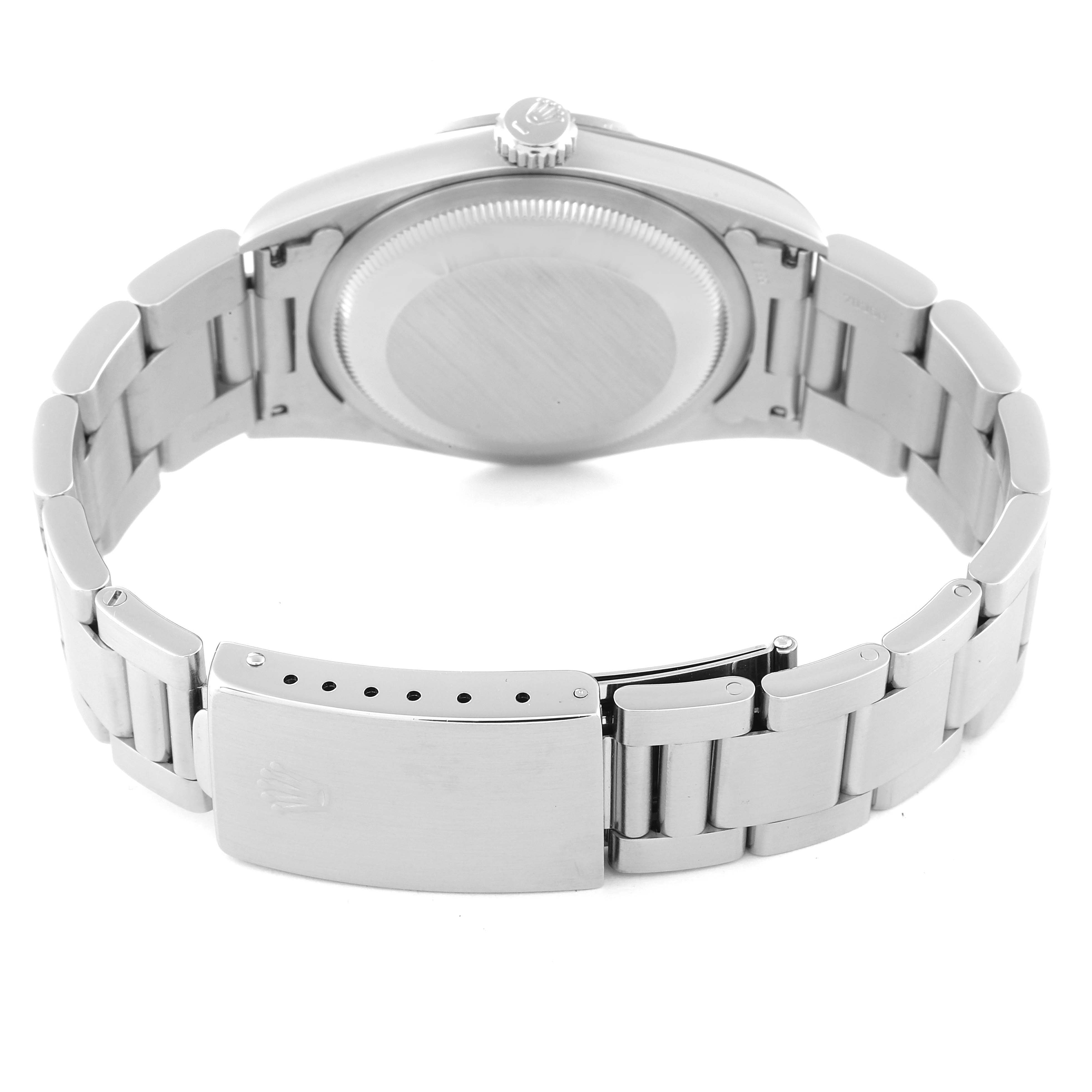 The image shows the back view of a Rolex Explorer 14270 Men
s Stainless Steel Black Dial 14270 Men
s Stainless Steel Black Dial watch, focusing on its case back, bracelet, and clasp.