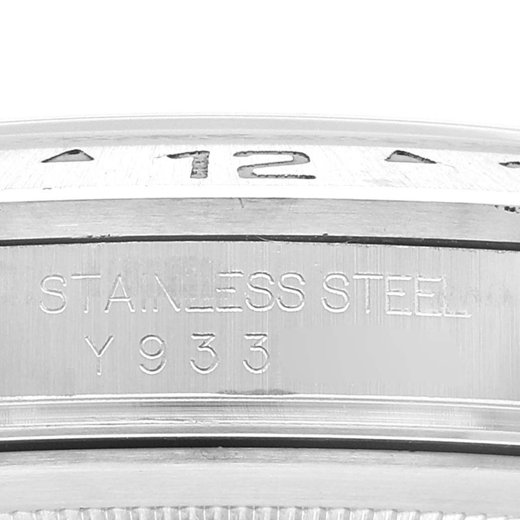 This close-up shows the engraving on the stainless steel case of a Rolex Explorer 16570 Men's Stainless Steel Black Dial 16570 Men's Stainless Steel Black Dial watch.