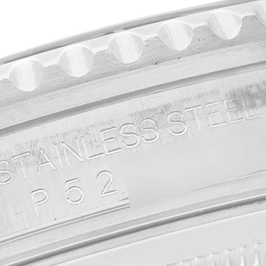 The image shows a detailed close-up of the stainless steel bezel and lug area of a Rolex GMT-Master 16710 Men's Stainless Steel Black Dial 16710 Men's Stainless Steel Black Dial watch.