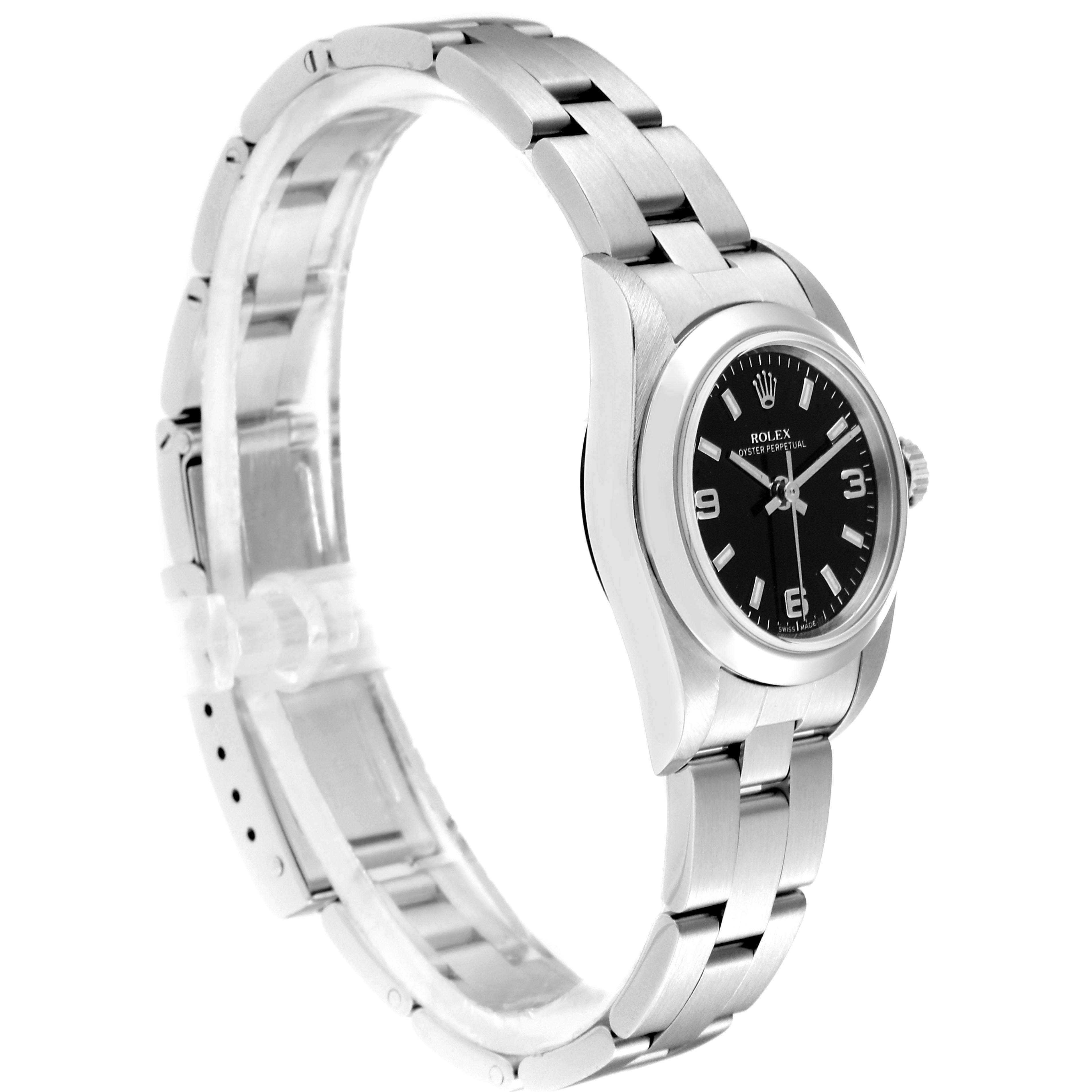 The Rolex Oyster Perpetual 76080 Women's Stainless Steel Black Dial 76080 Women's Stainless Steel Black Dial watch is displayed at a slight angle, showing the face, bezel, crown, and bracelet.