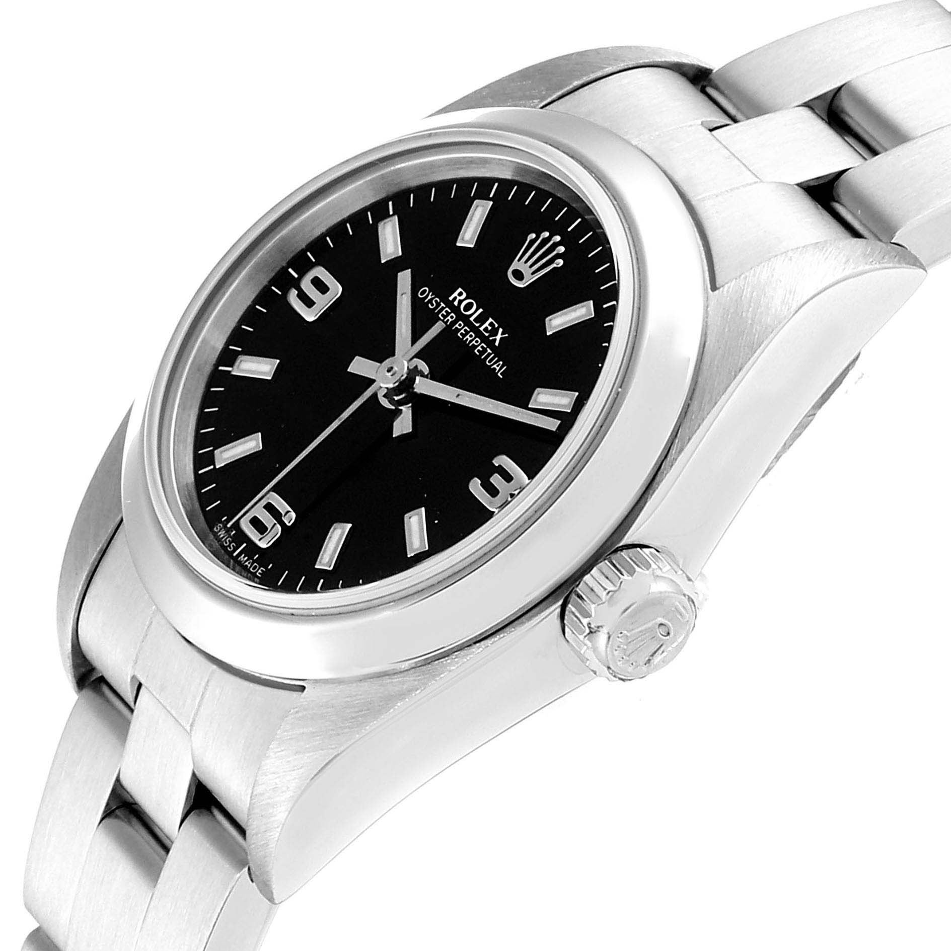 This image shows a Rolex Oyster Perpetual 76080 Women's Stainless Steel Black Dial 76080 Women's Stainless Steel Black Dial watch at an angled view, highlighting the face, bezel, crown, and part of the bracelet.