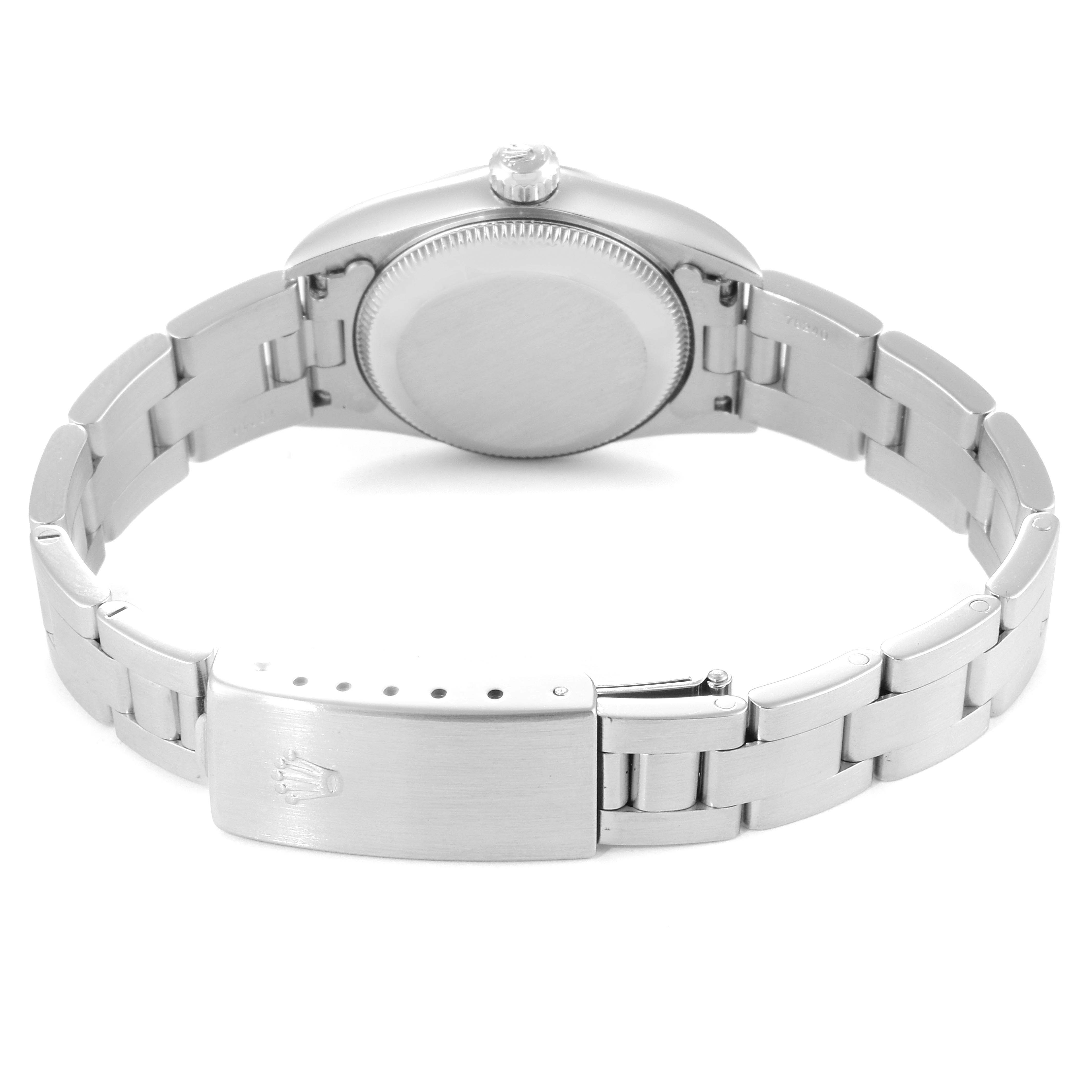 The image shows the back and bracelet of a Rolex Oyster Perpetual 76080 Women's Stainless Steel Black Dial 76080 Women's Stainless Steel Black Dial watch laid flat, displaying the clasp and case back.